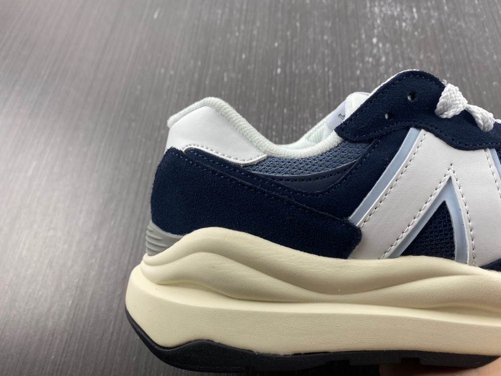 New Balance navy and white trainer