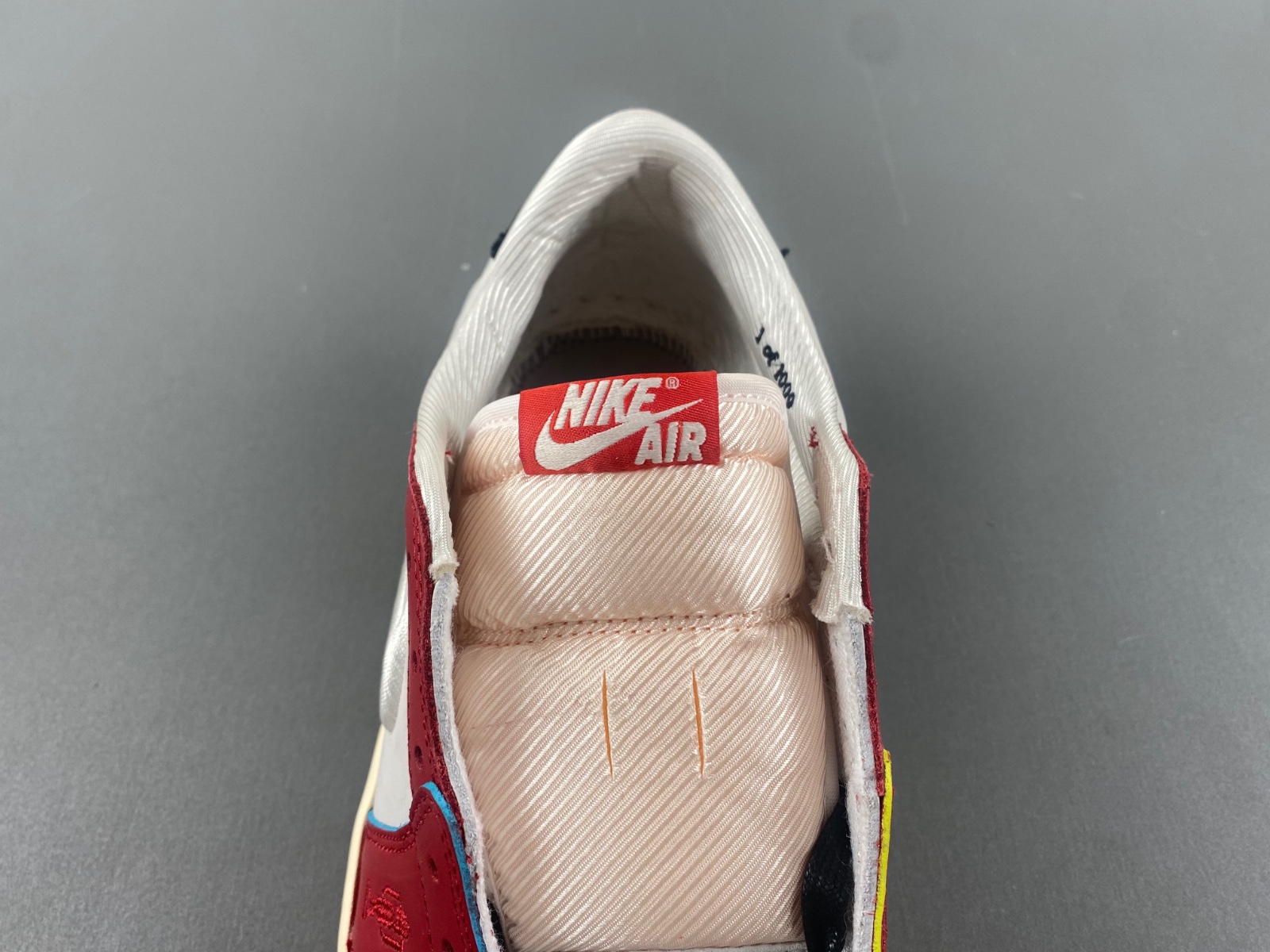 Air Jordan 1 Low OG x Trophy Room Sail and Varsity Red