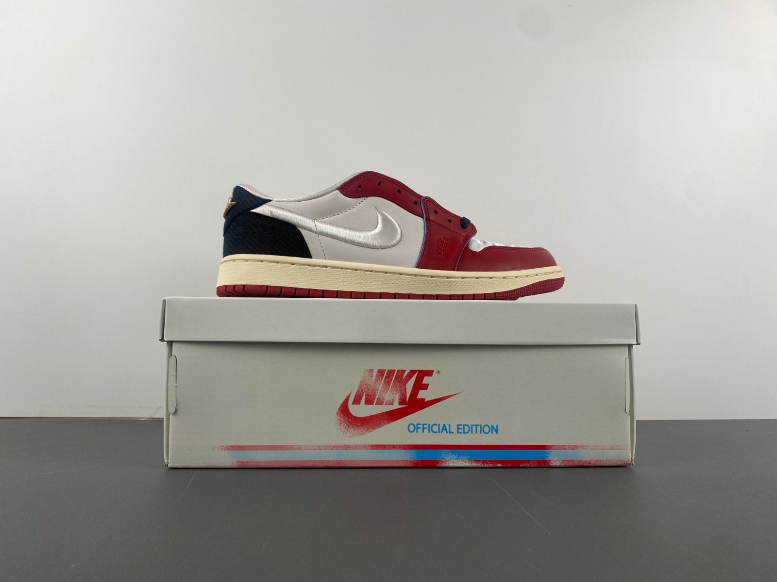 Air Jordan 1 Low OG x Trophy Room Sail and Varsity Red