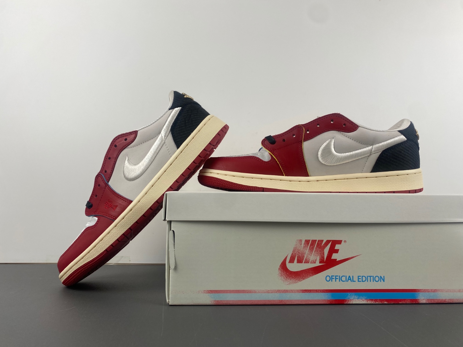 Air Jordan 1 Low OG x Trophy Room Sail and Varsity Red
