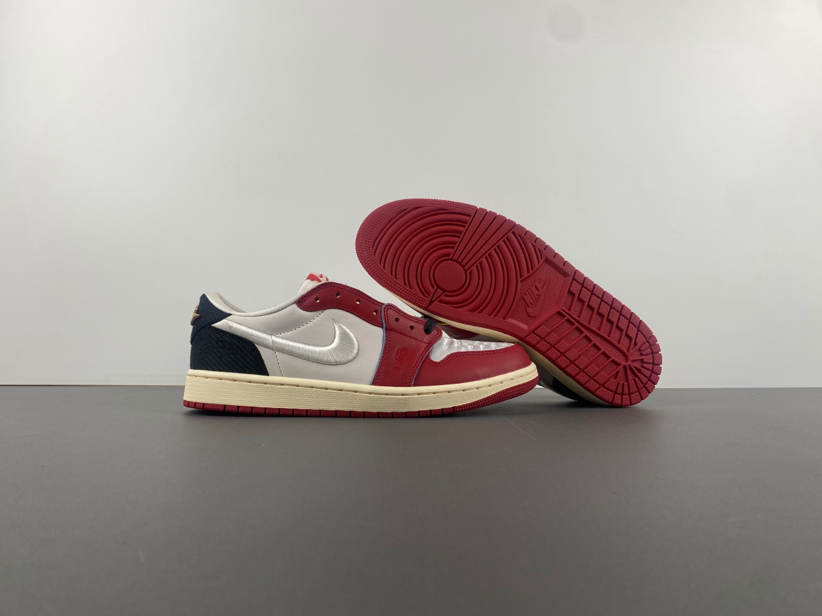 Air Jordan 1 Low OG x Trophy Room Sail and Varsity Red