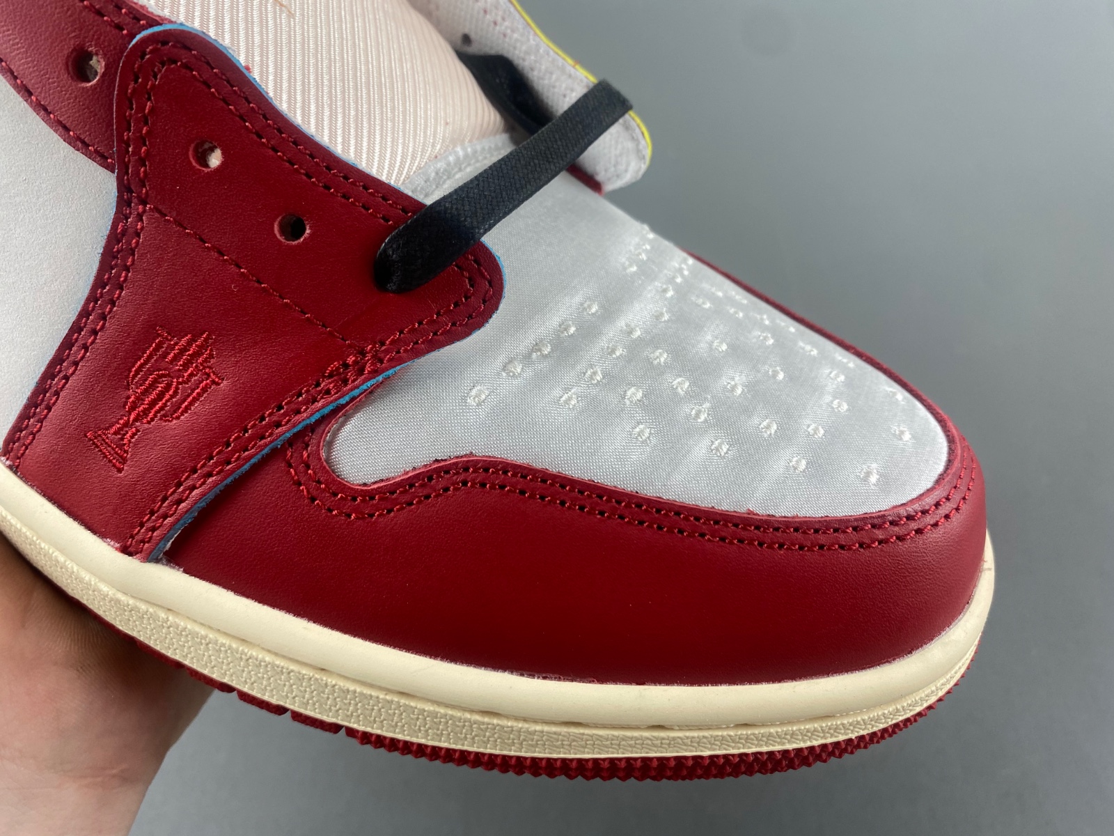 Air Jordan 1 Low OG x Trophy Room Sail and Varsity Red