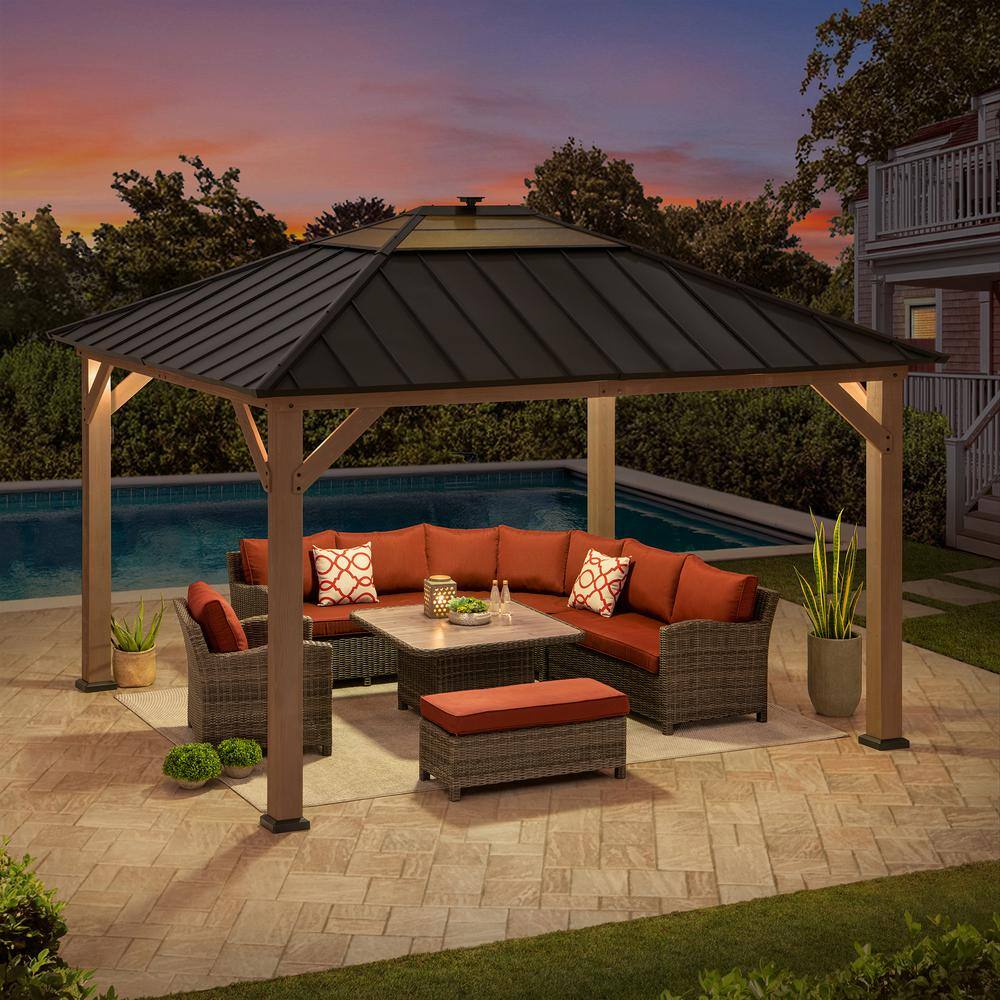 Sunjoy 11 ft. x 13 ft. Cedar Framed Gazebo with Brown Steel and Polycarbonate Hip Roof with Solar Powered LED Lights A102005891