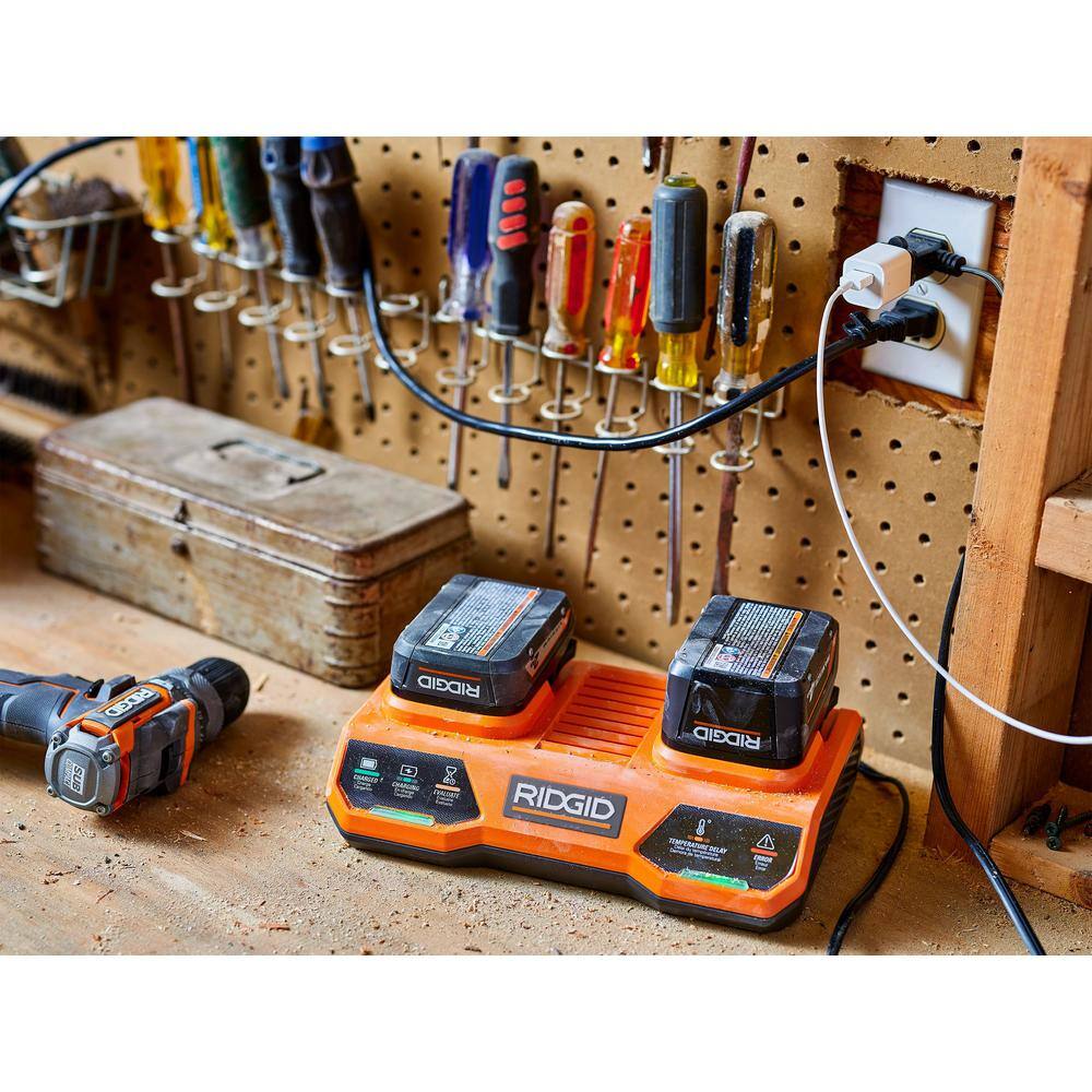 RIDGID 18V (2) 4.0 Ah Batteries and Charger Kit with 18V Dual Port Simultaneous Charger AC93044SBN-AC86095
