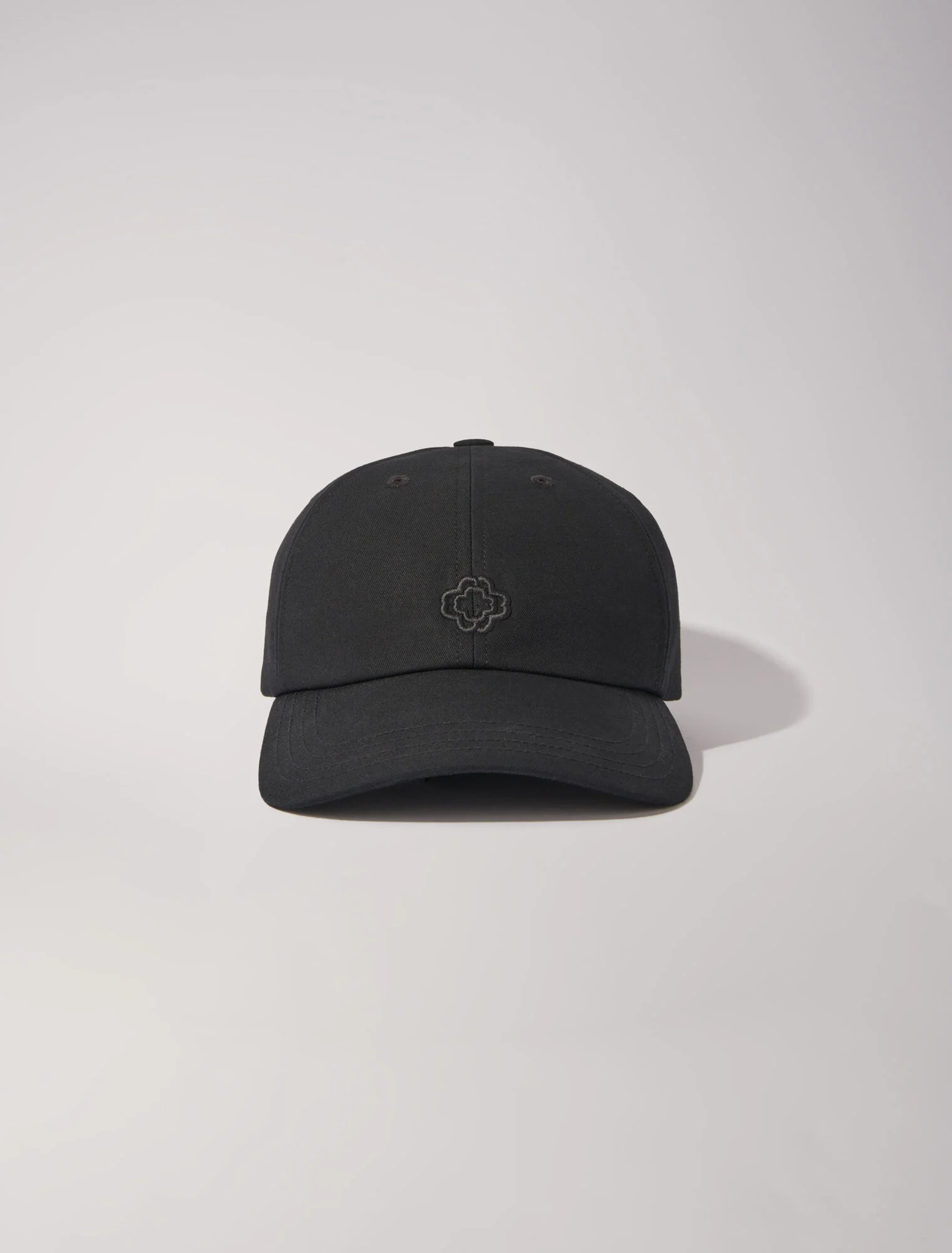 Cotton cap with gold-tone buckle