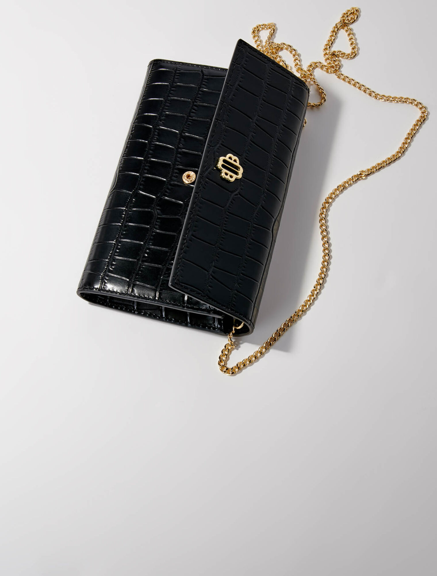 Croc-effect embossed leather bag