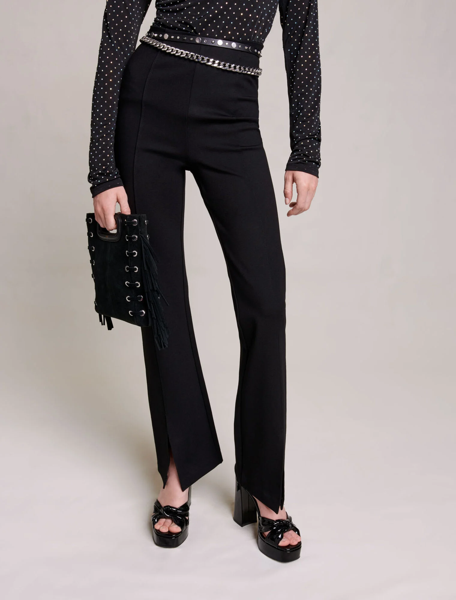 Black slim-fit trousers with slits