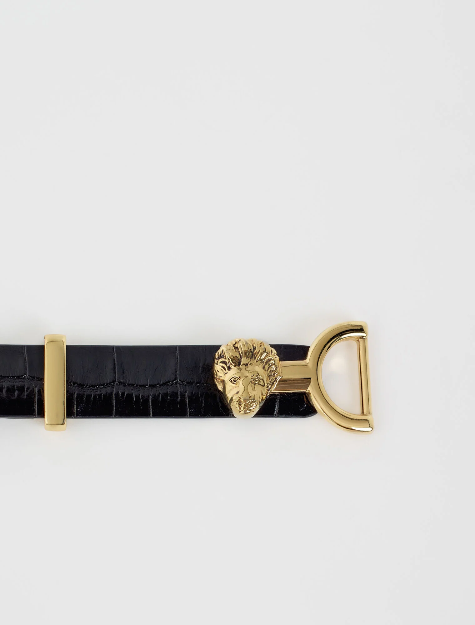 Embossed leather and lion horsebit belt