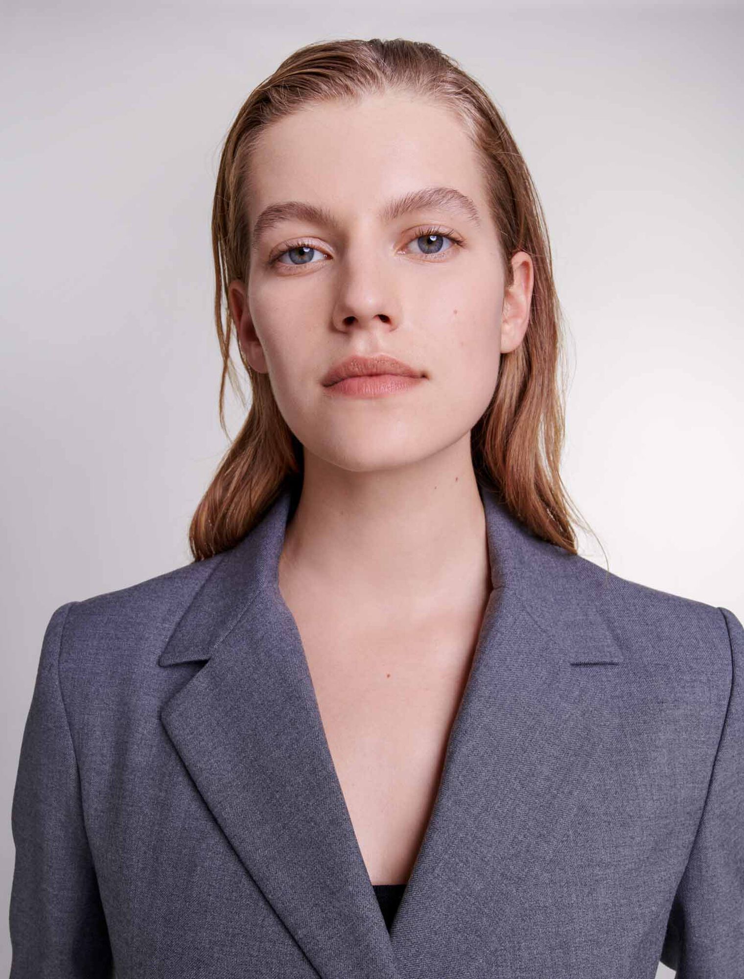 Suit jacket with chain belt