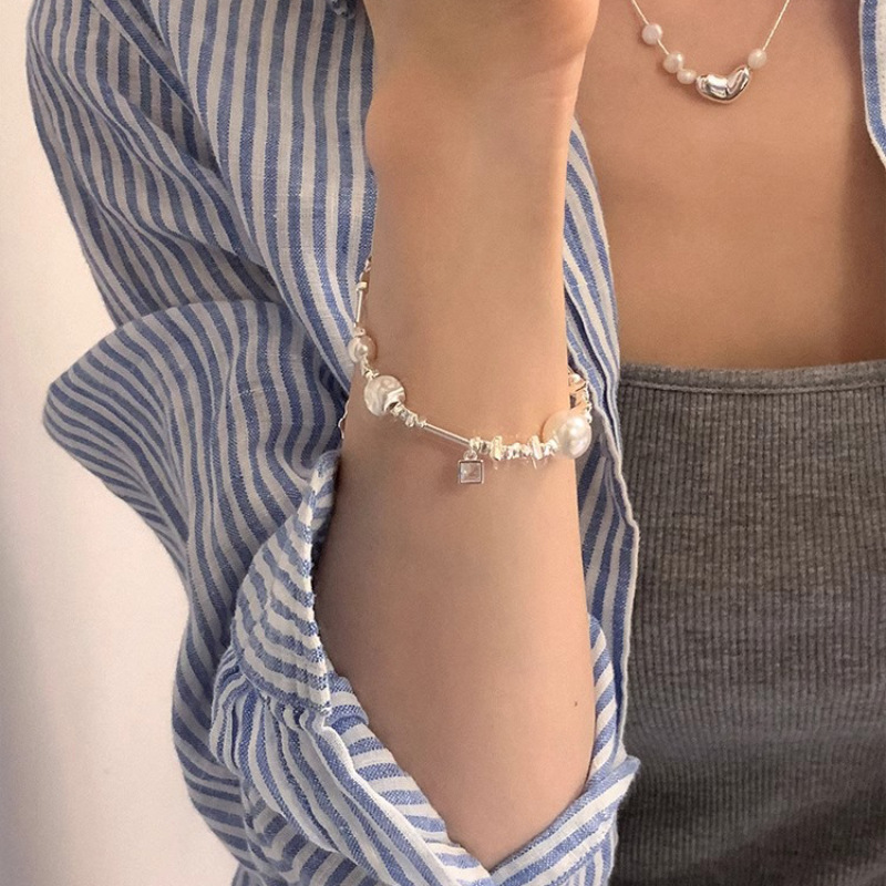 Niche design cat eye pearl broken silver bracelet for women light luxury style