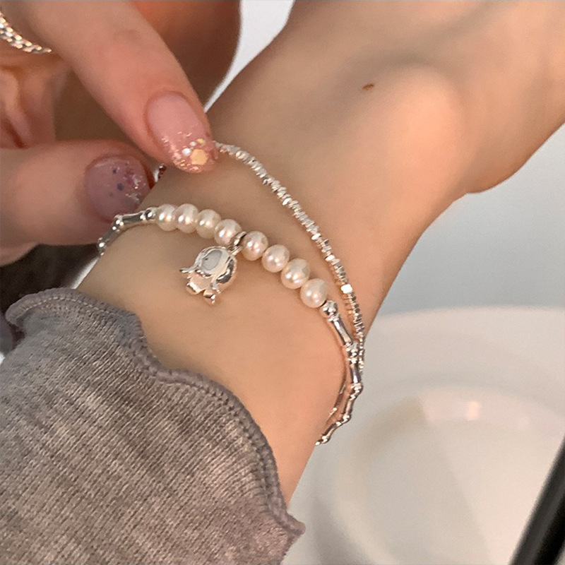Light luxury style niche design lily of the valley broken silver bracelet