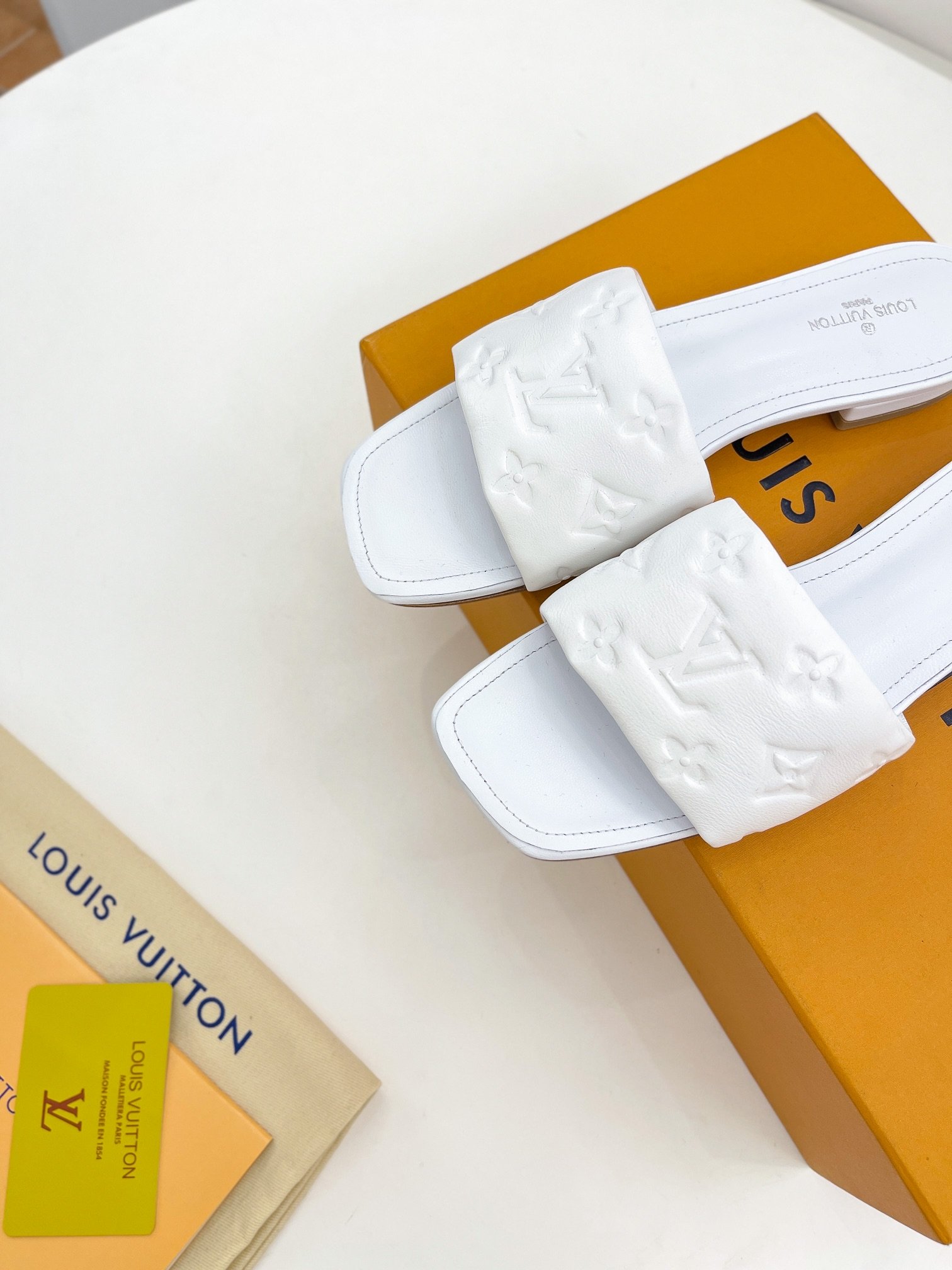 Louis Vuitton Women's Revival Flat Mule White For Women LV 1A9P4P - Soul Replicas