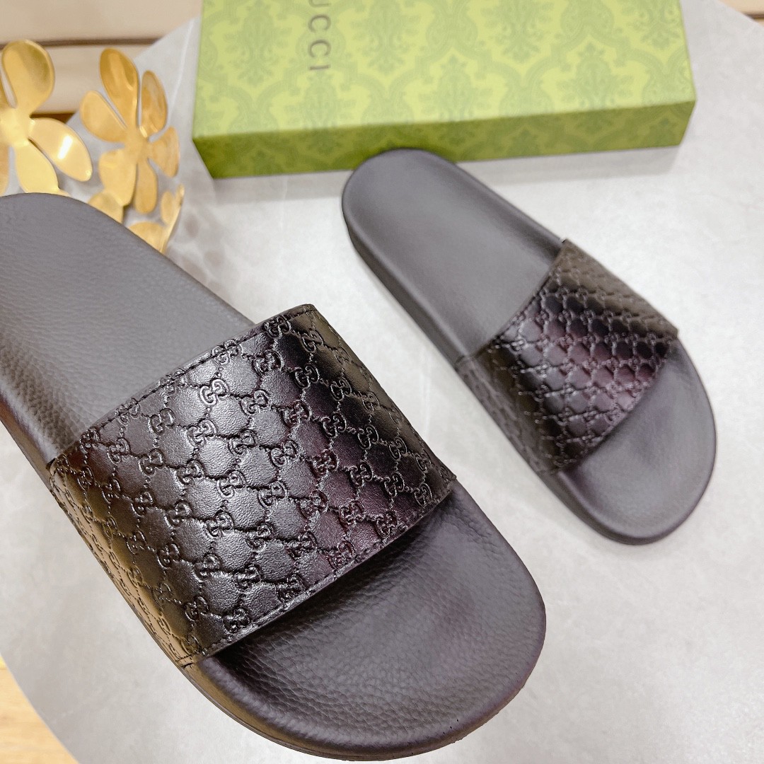 Gucci Women's Embossed Gucci Slide Sandal Black For Women 407345 - Soul Replicas