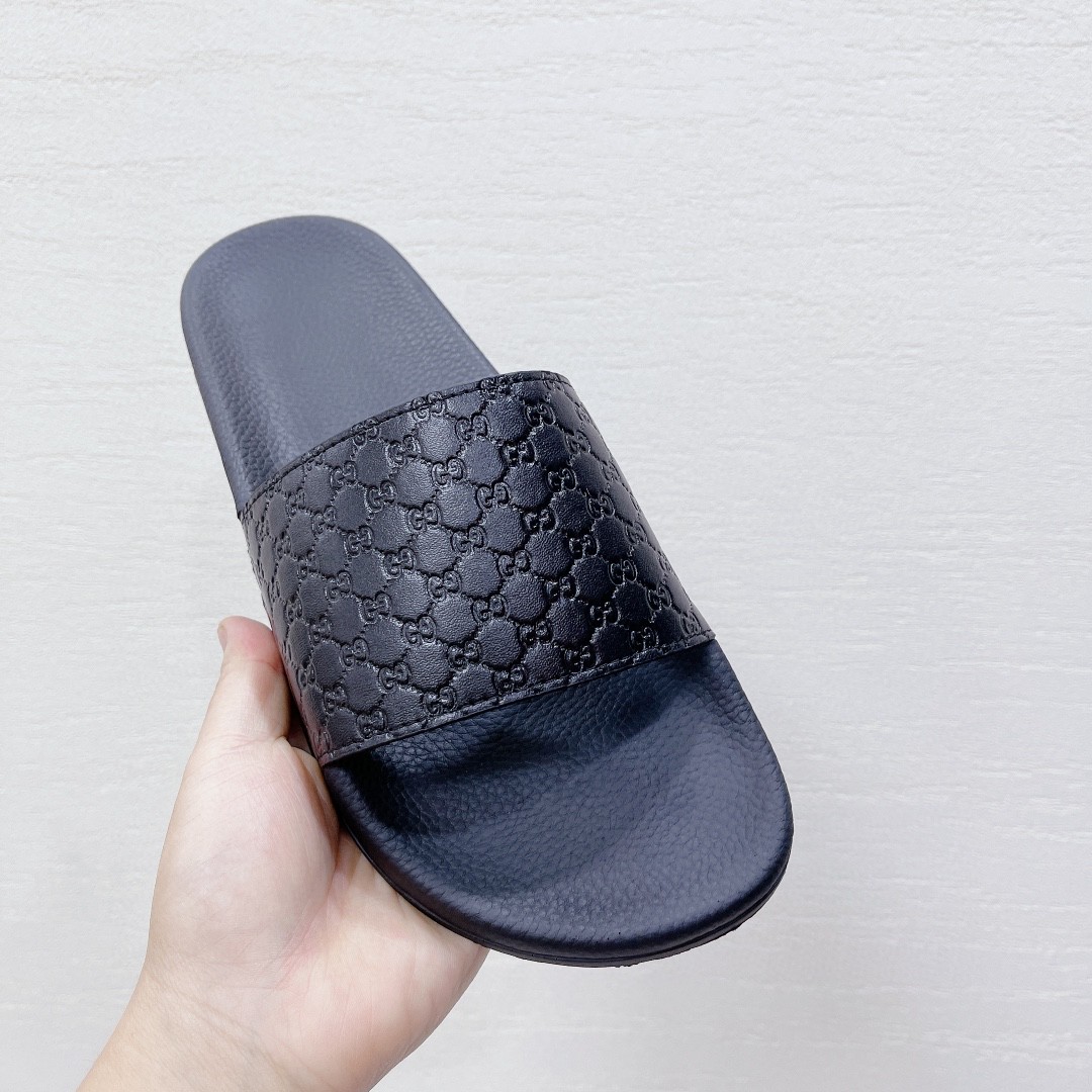 Gucci Women's Embossed Gucci Slide Sandal Black For Women 407345 - Soul Replicas