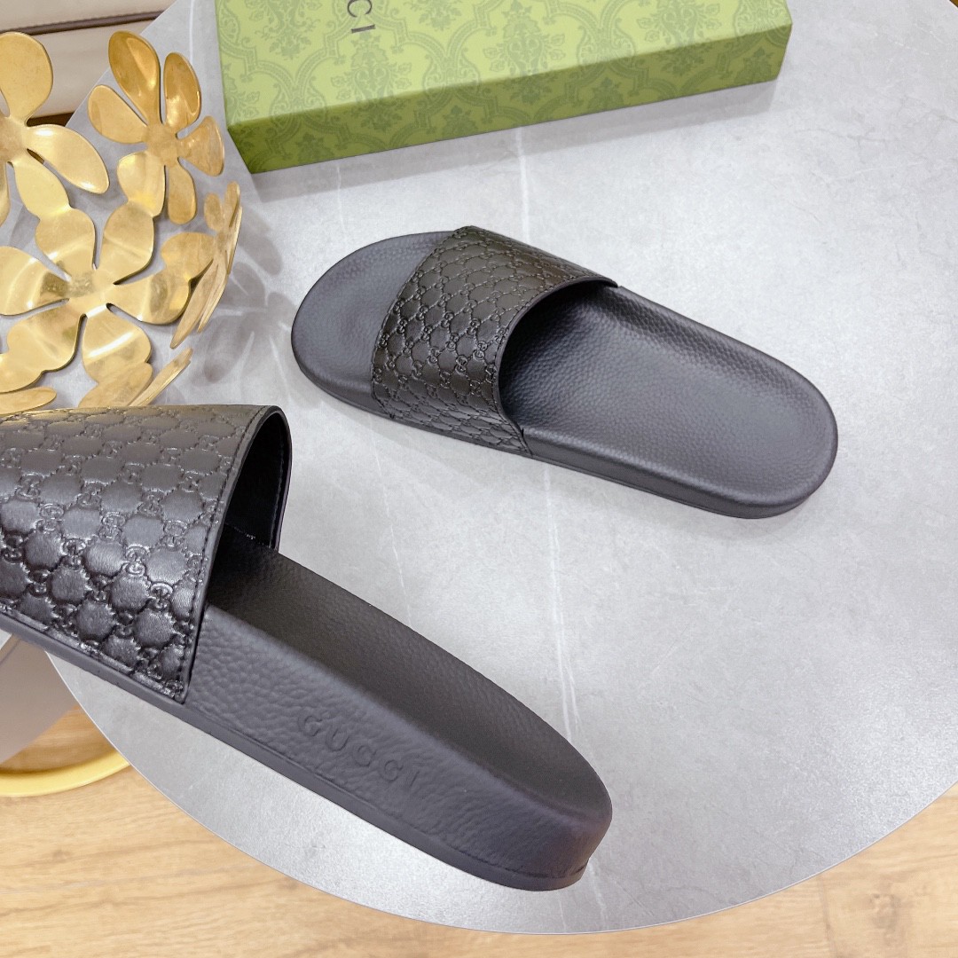 Gucci Women's Embossed Gucci Slide Sandal Black For Women 407345 - Soul Replicas