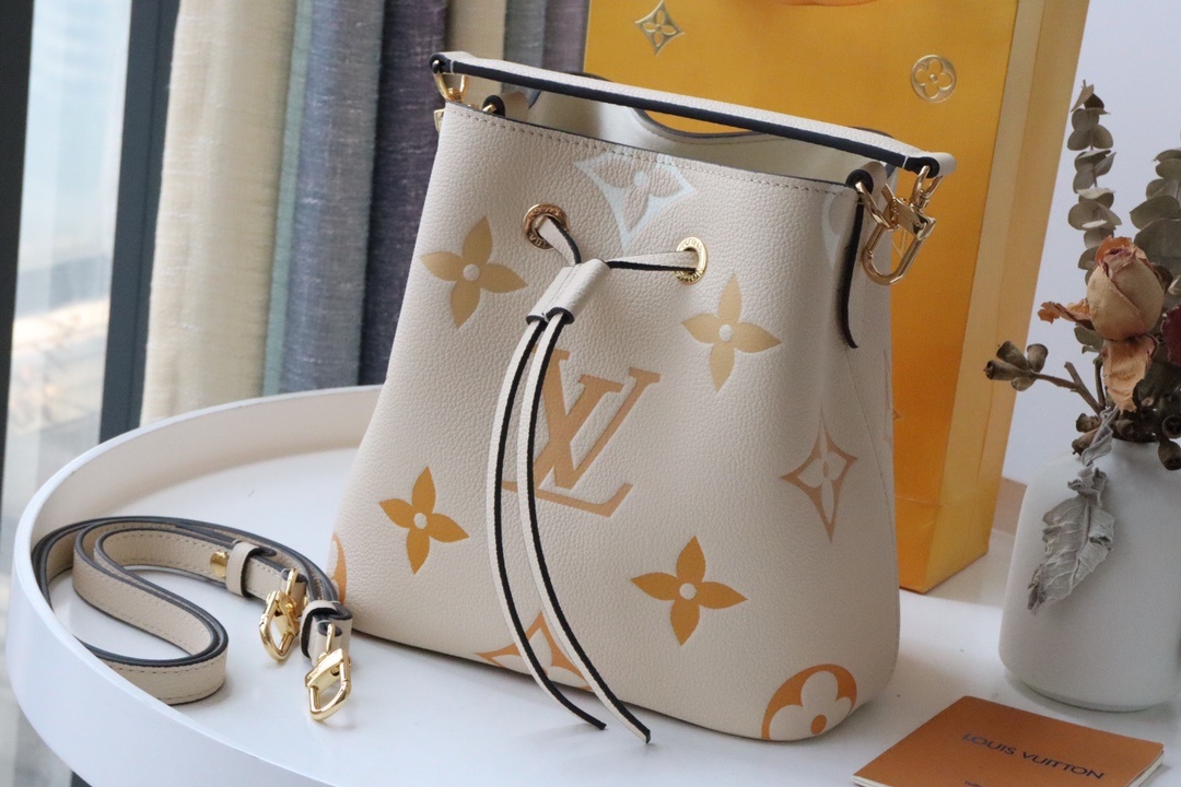 Louis Vuitton NeoNoe BB Bucket Bag Monogram Empreinte Cream/Saffron For Women. Women's Bags. Shoulder Bags 7.9in/20cm LV M45716 - Soul Replicas