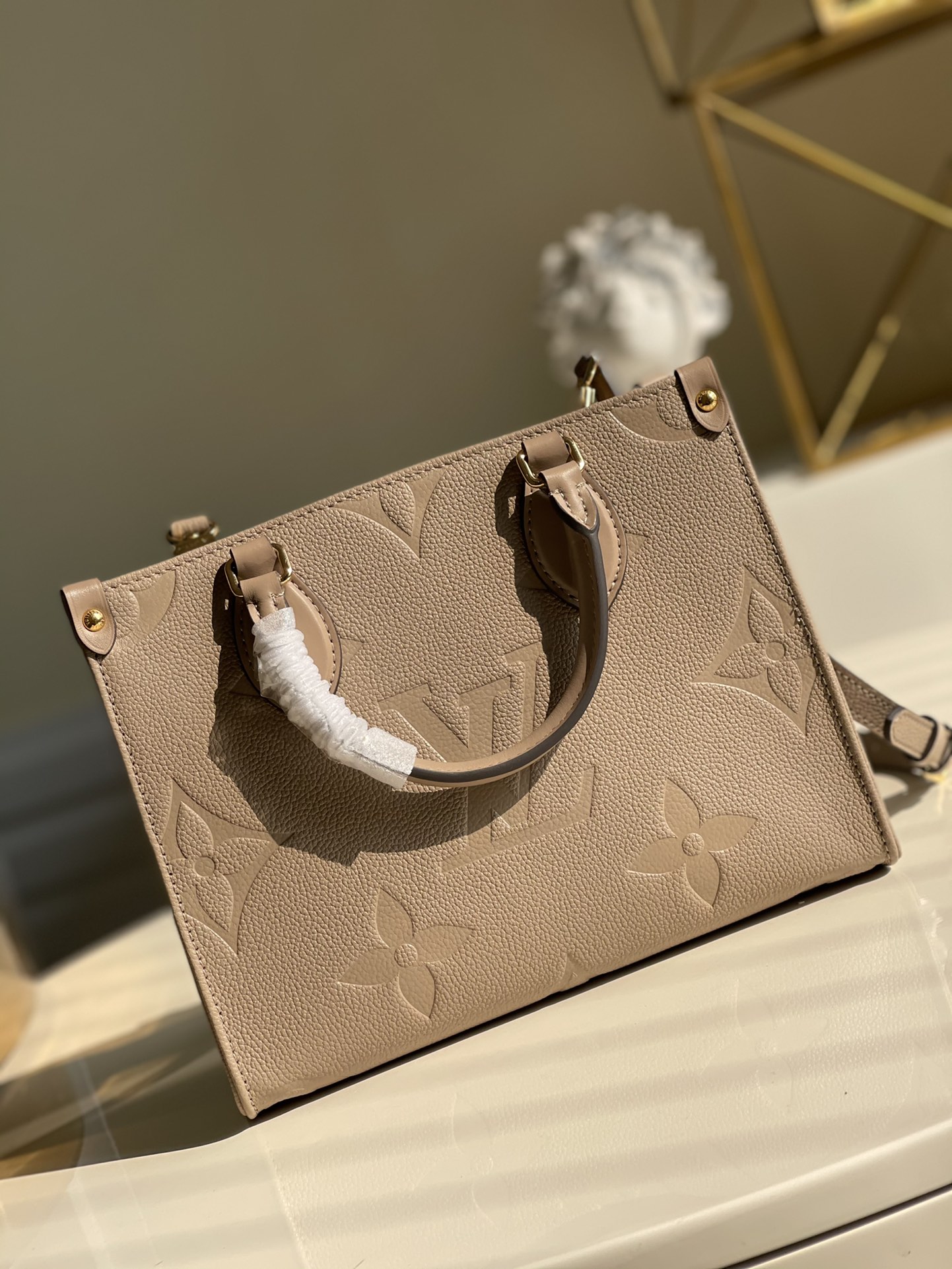 Louis Vuitton OnTheGo PM Tote Bag Monogram Empreinte Beige For Women. Women's Handbags. Shoulder And Crossbody Bags 9.8in/25cm LV - Soul Replicas