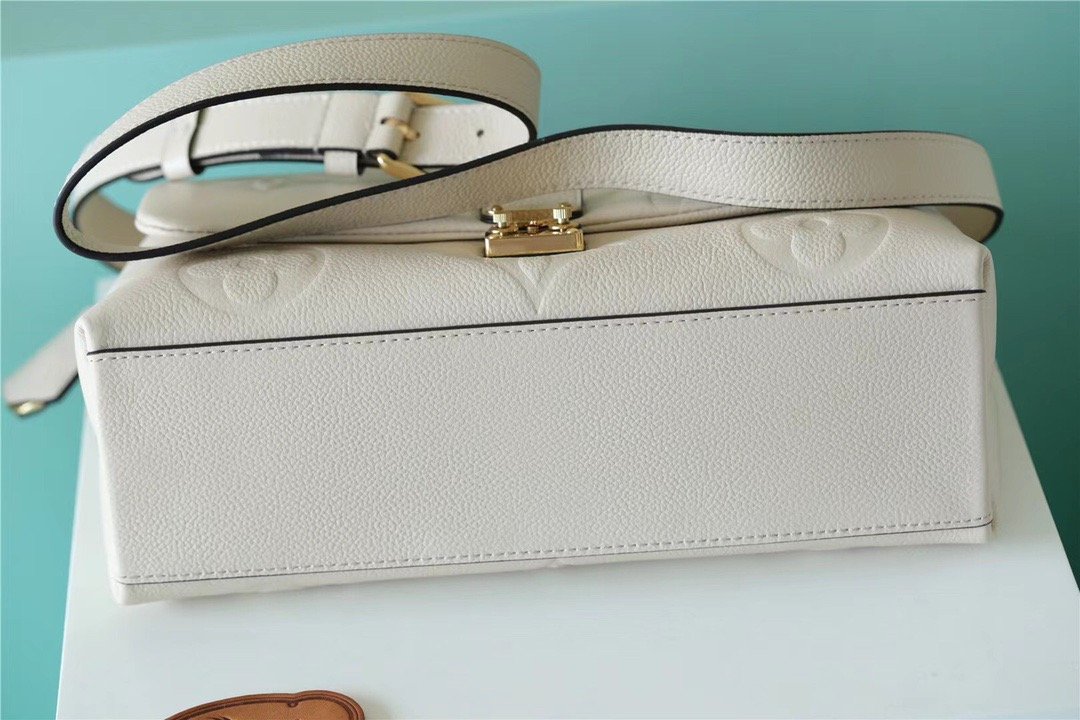 Louis Vuitton Madeleine MM Monogram Empreinte Creme Beige For Women. Women-s Handbags. Shoulder and Crossbody Bags 11.8in/30cm LV - Soul Replicas