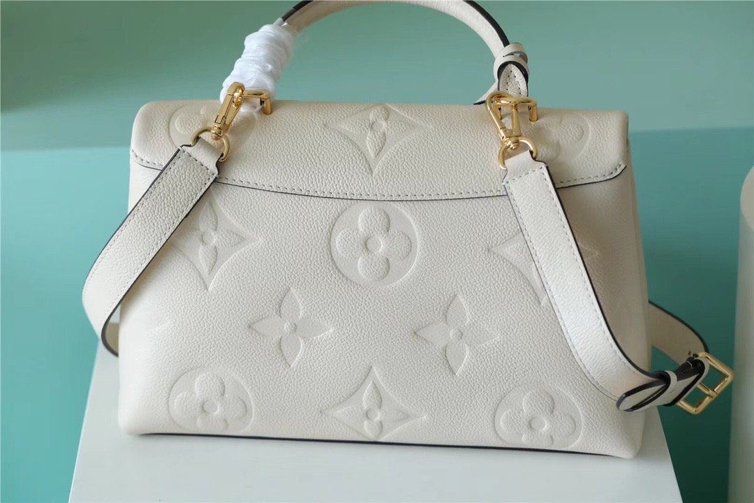 Louis Vuitton Madeleine MM Monogram Empreinte Creme Beige For Women. Women-s Handbags. Shoulder and Crossbody Bags 11.8in/30cm LV - Soul Replicas