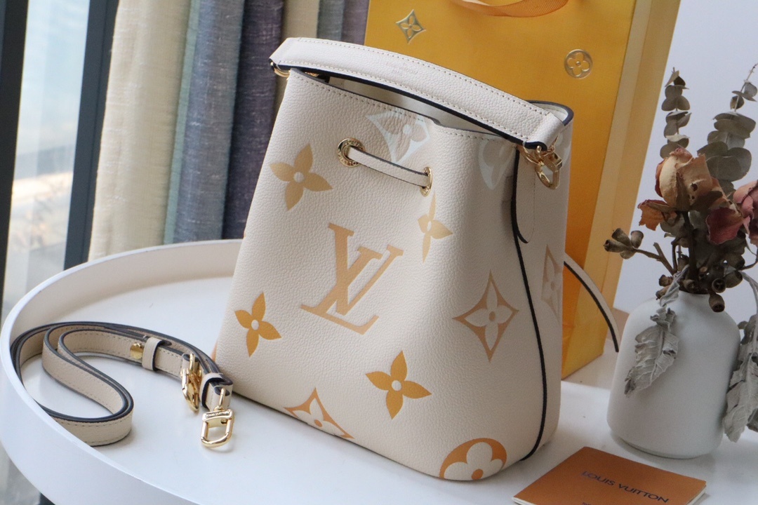 Louis Vuitton NeoNoe BB Bucket Bag Monogram Empreinte Cream/Saffron For Women. Women's Bags. Shoulder Bags 7.9in/20cm LV M45716 - Soul Replicas