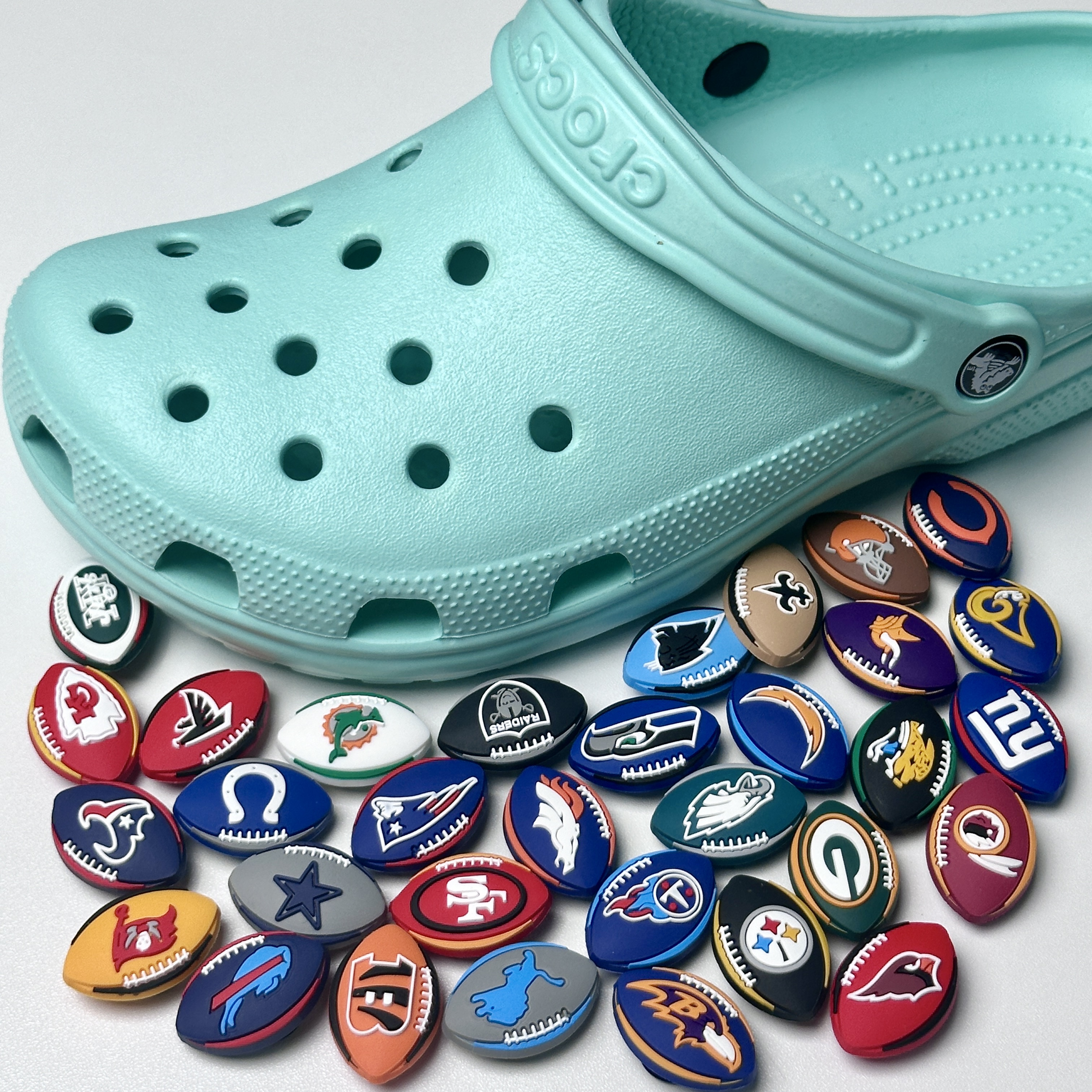 Exclusive American Football Squad Logo Accents for Crocs & Clog Footwear - Show Your Team Spirit with Stylish NFL or College Mascot Designs on Your Shoe Charms