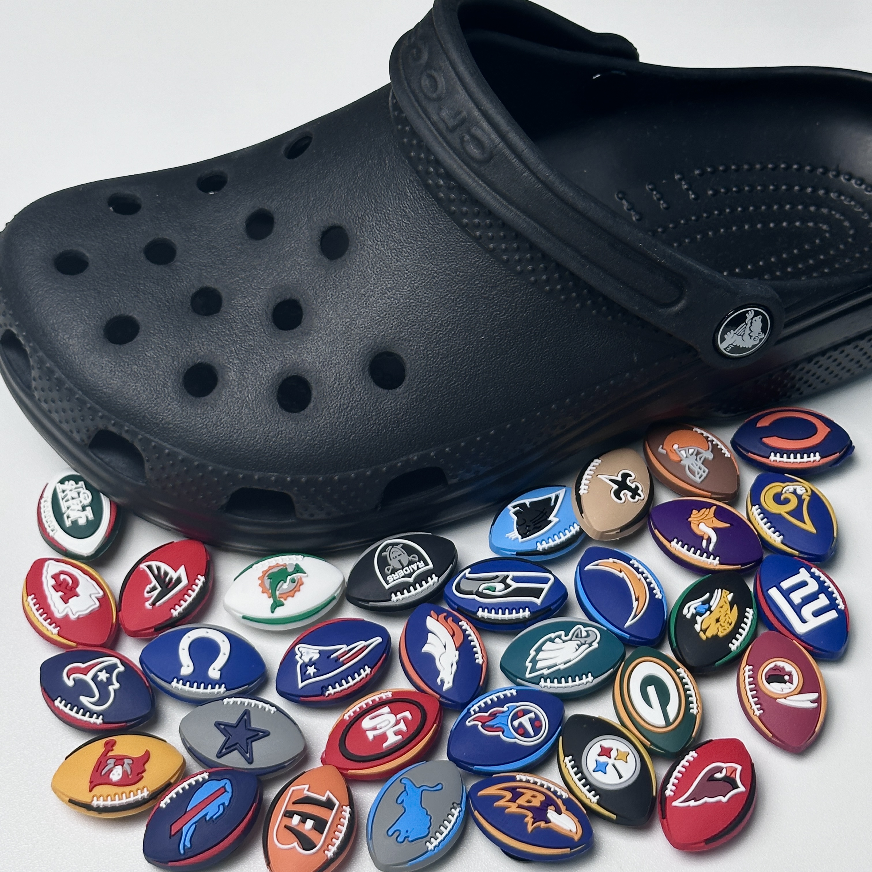 Exclusive American Football Squad Logo Accents for Crocs & Clog Footwear - Show Your Team Spirit with Stylish NFL or College Mascot Designs on Your Shoe Charms