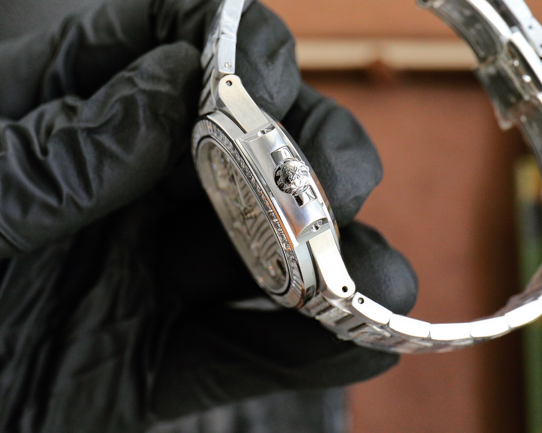 Patek Philippe Nautilus Ladies White Gold Diamond Bezel 7118