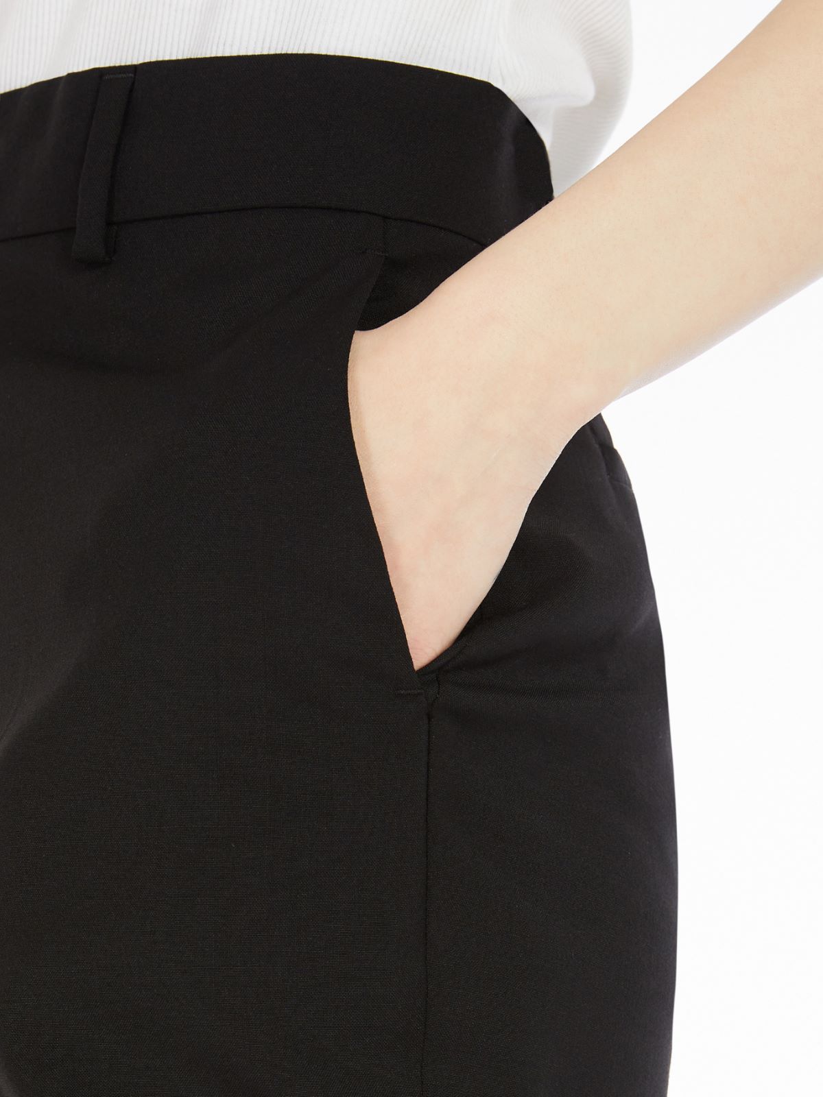 Flared stretch wool trousers