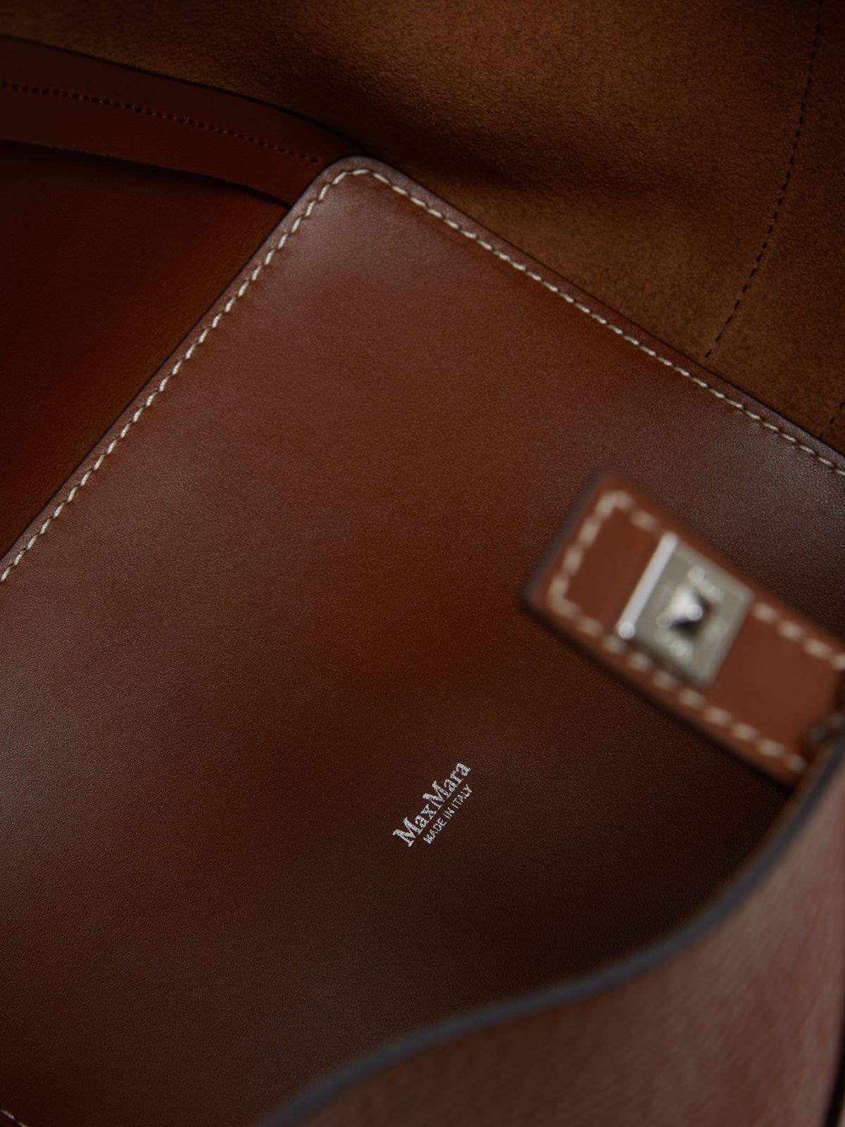 Small bucket bag in deer-print leather