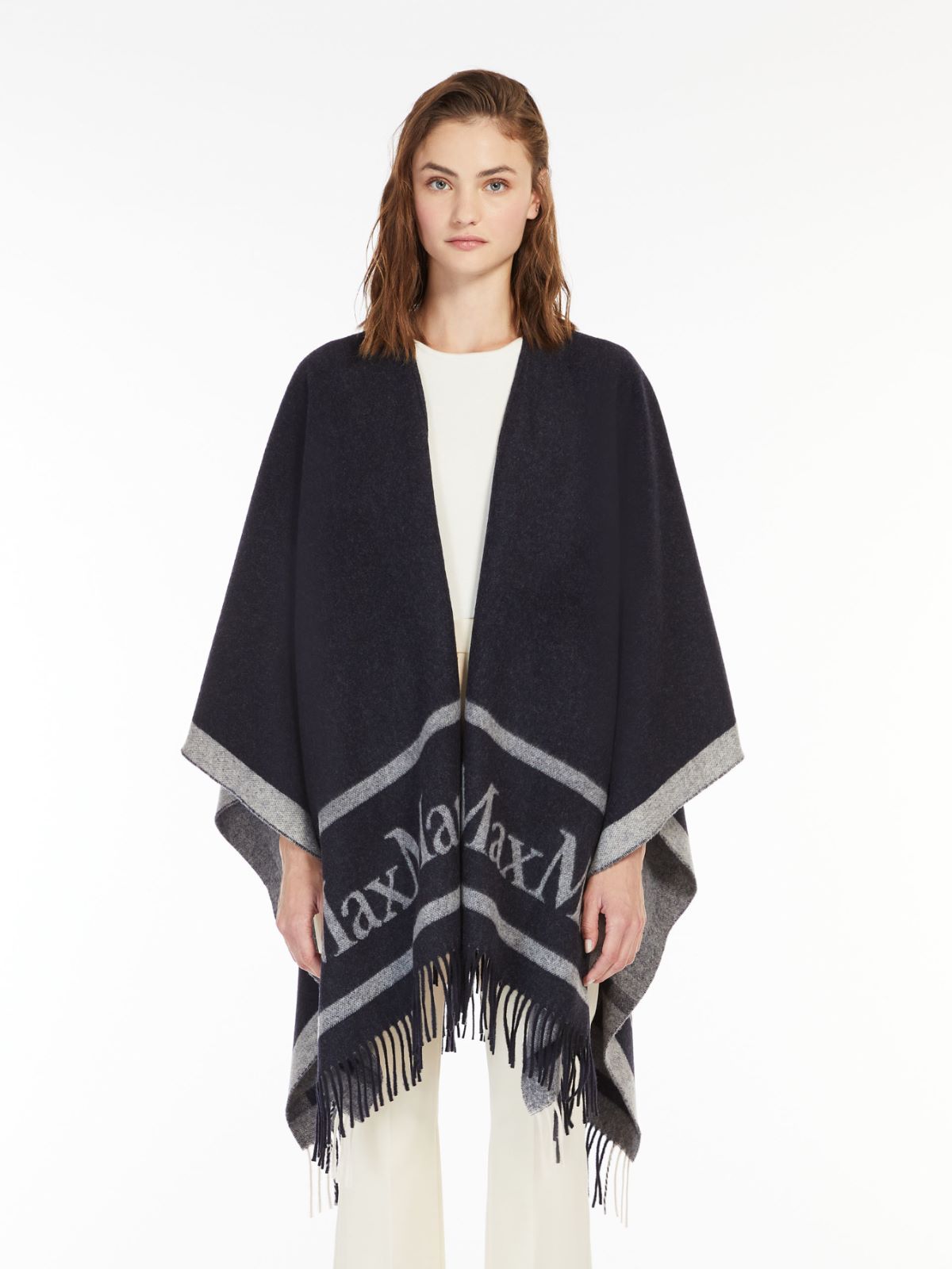 Wool cloak with fringes