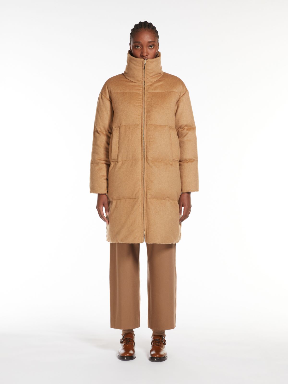 Long, reversible camel colour down jacket
