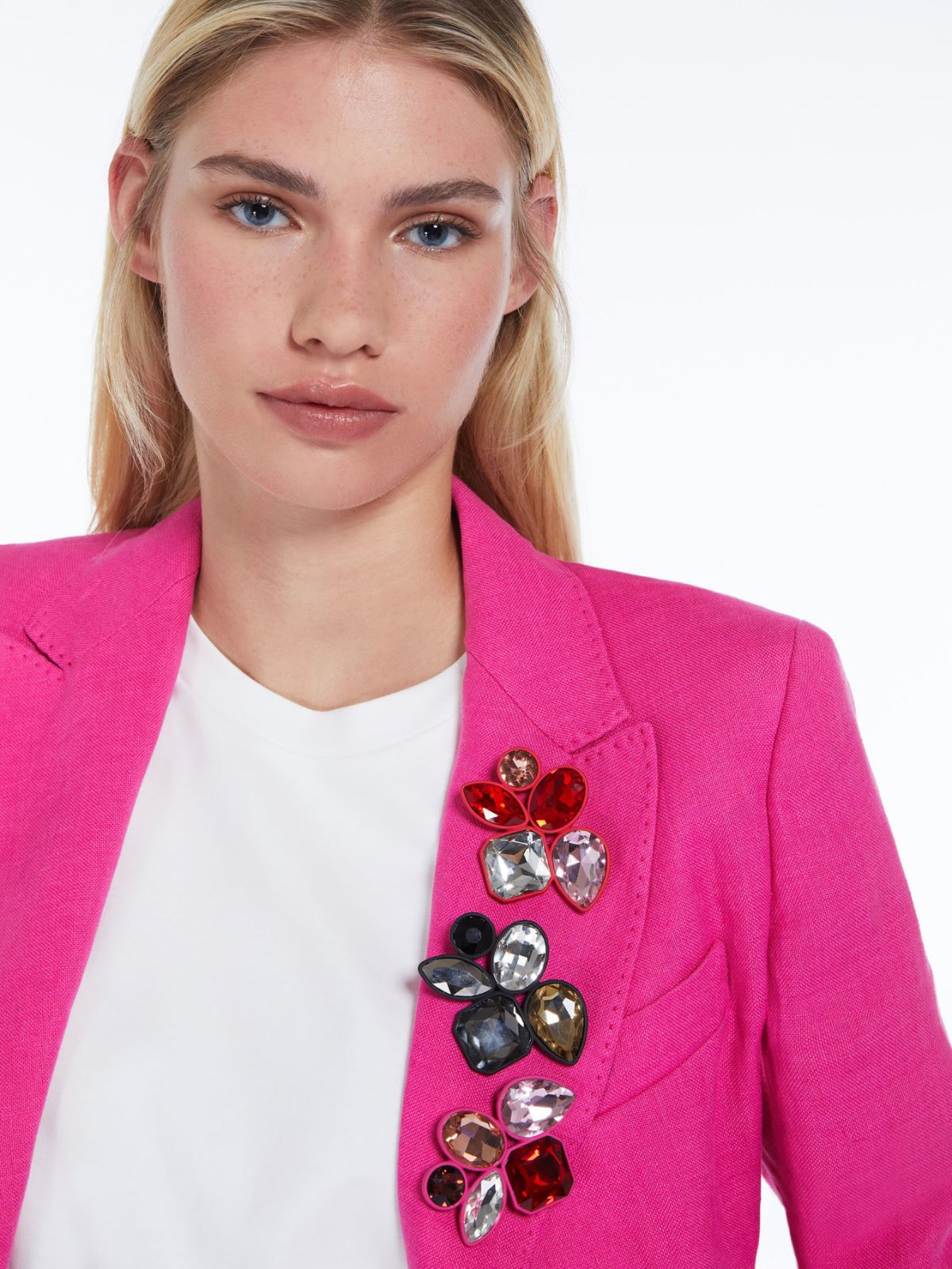 Metal and glass brooch