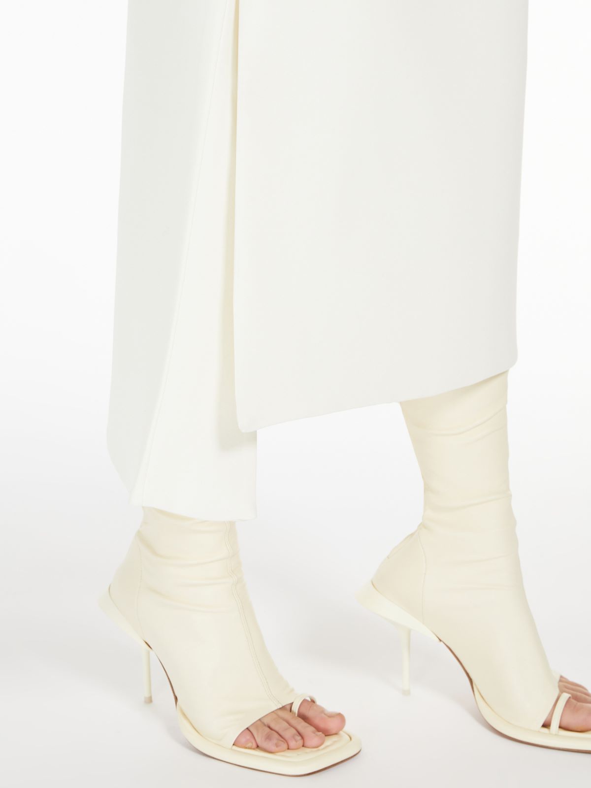 Calf-length skirt with side panels