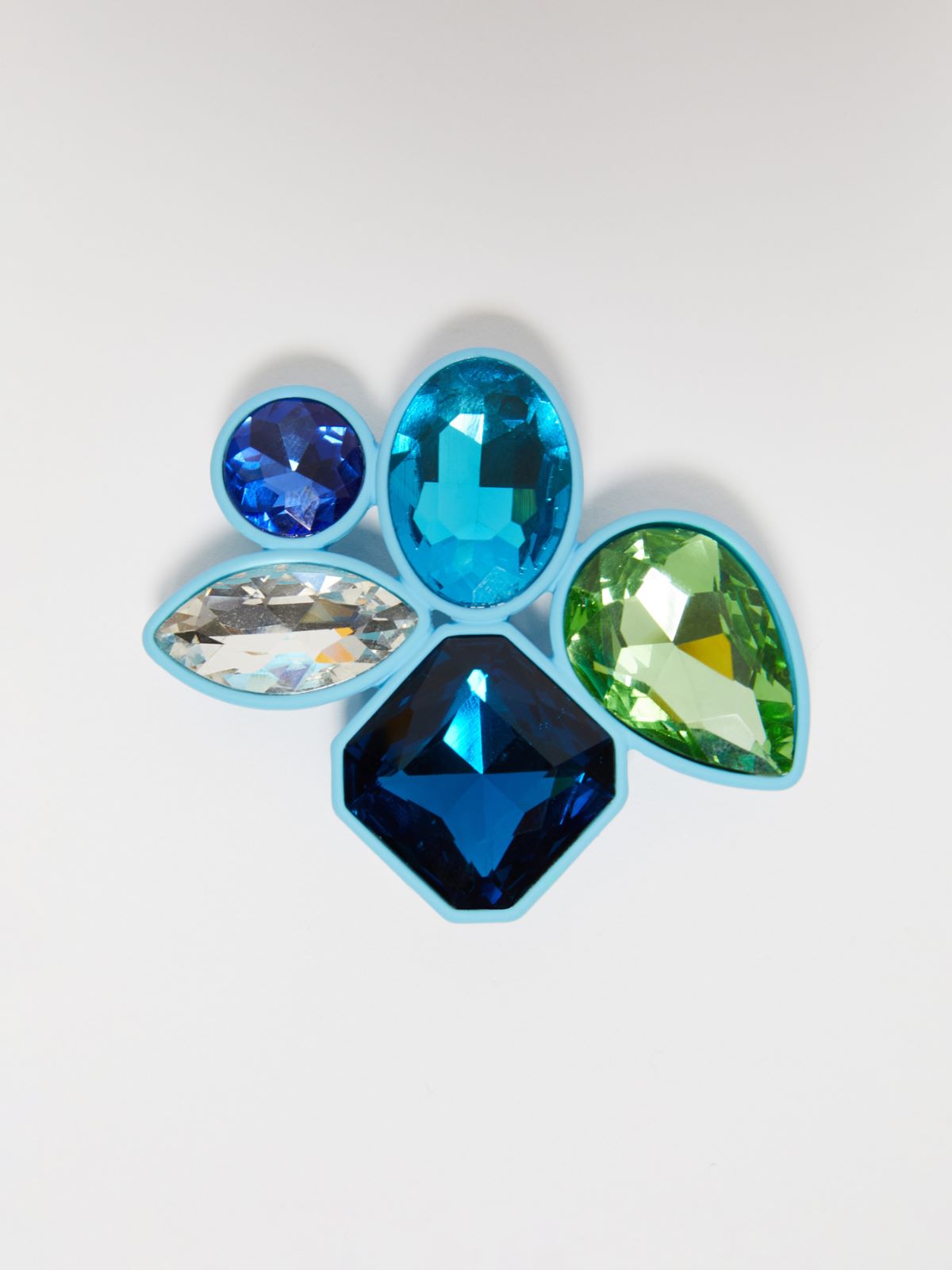 Metal and glass brooch