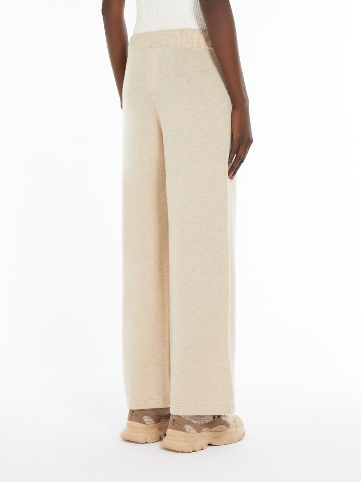 Wide-fit knit fabric trousers