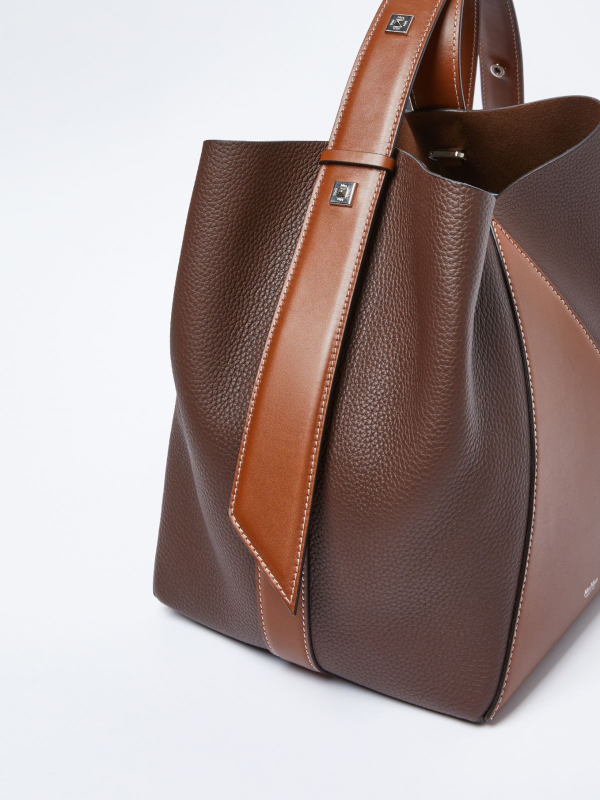 Medium bucket bag in deer-print leather