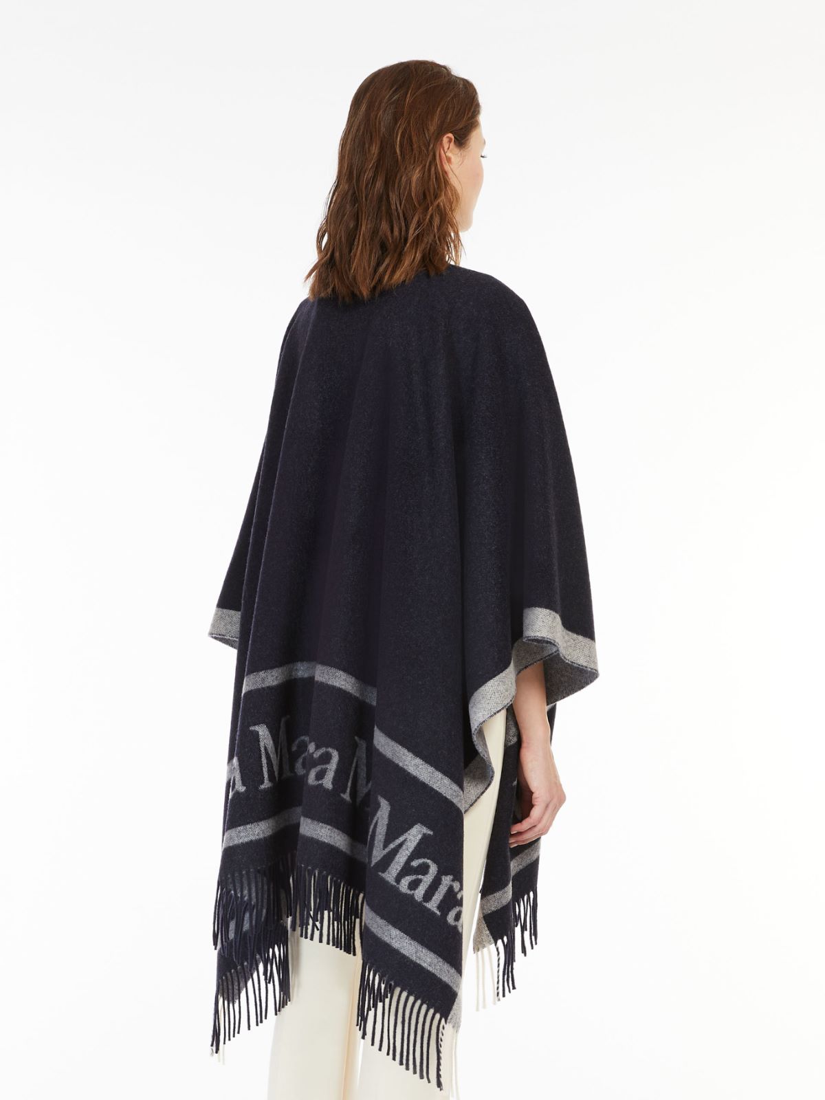 Wool cloak with fringes