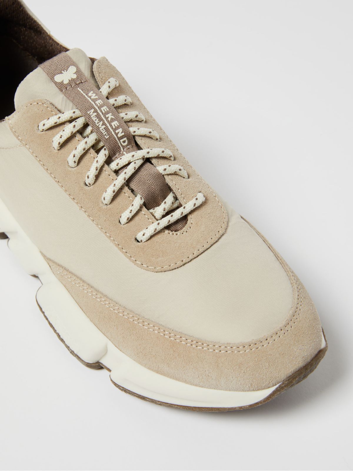 Nylon and leather running shoes