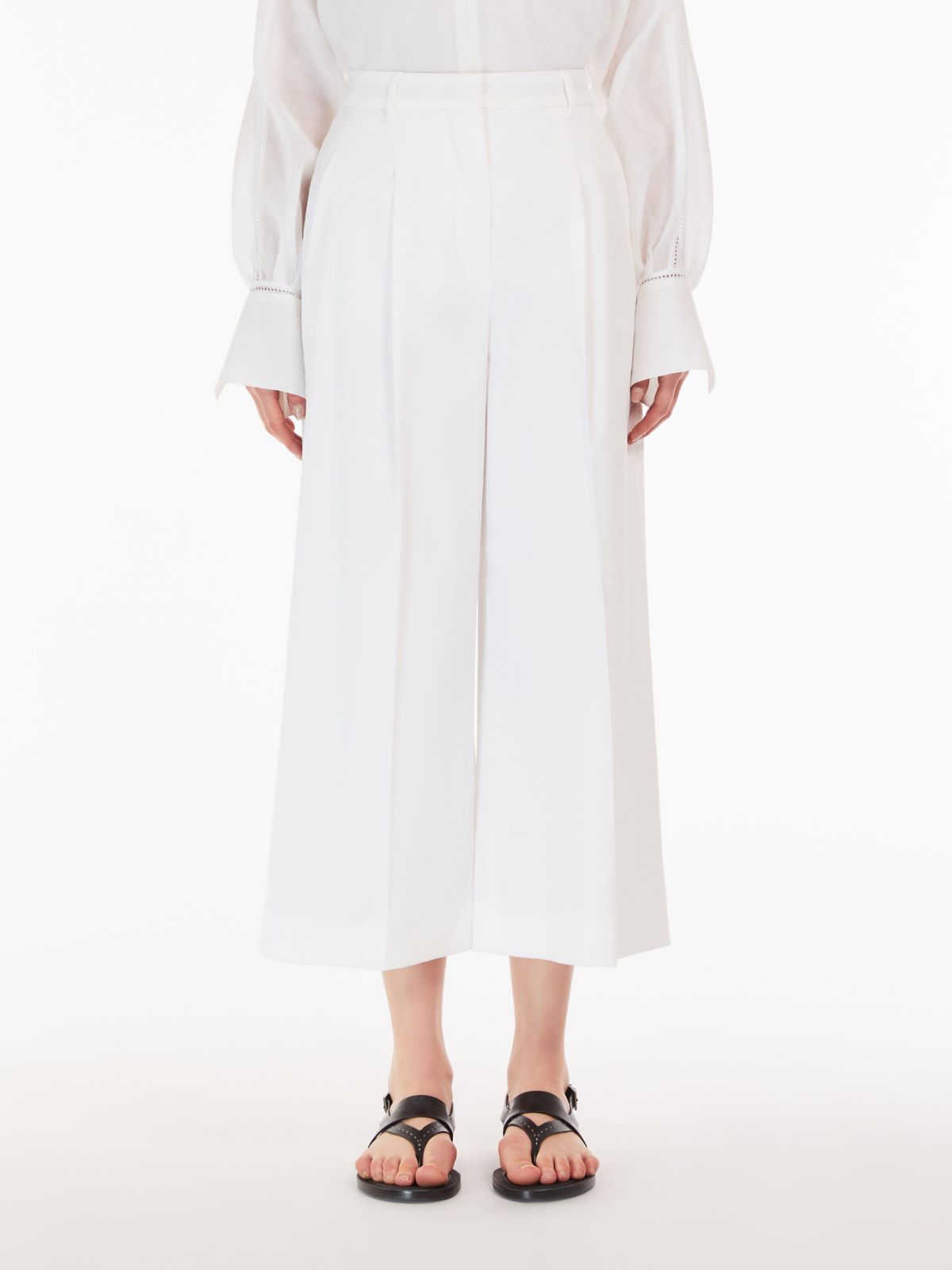 Cropped stretch cotton trousers