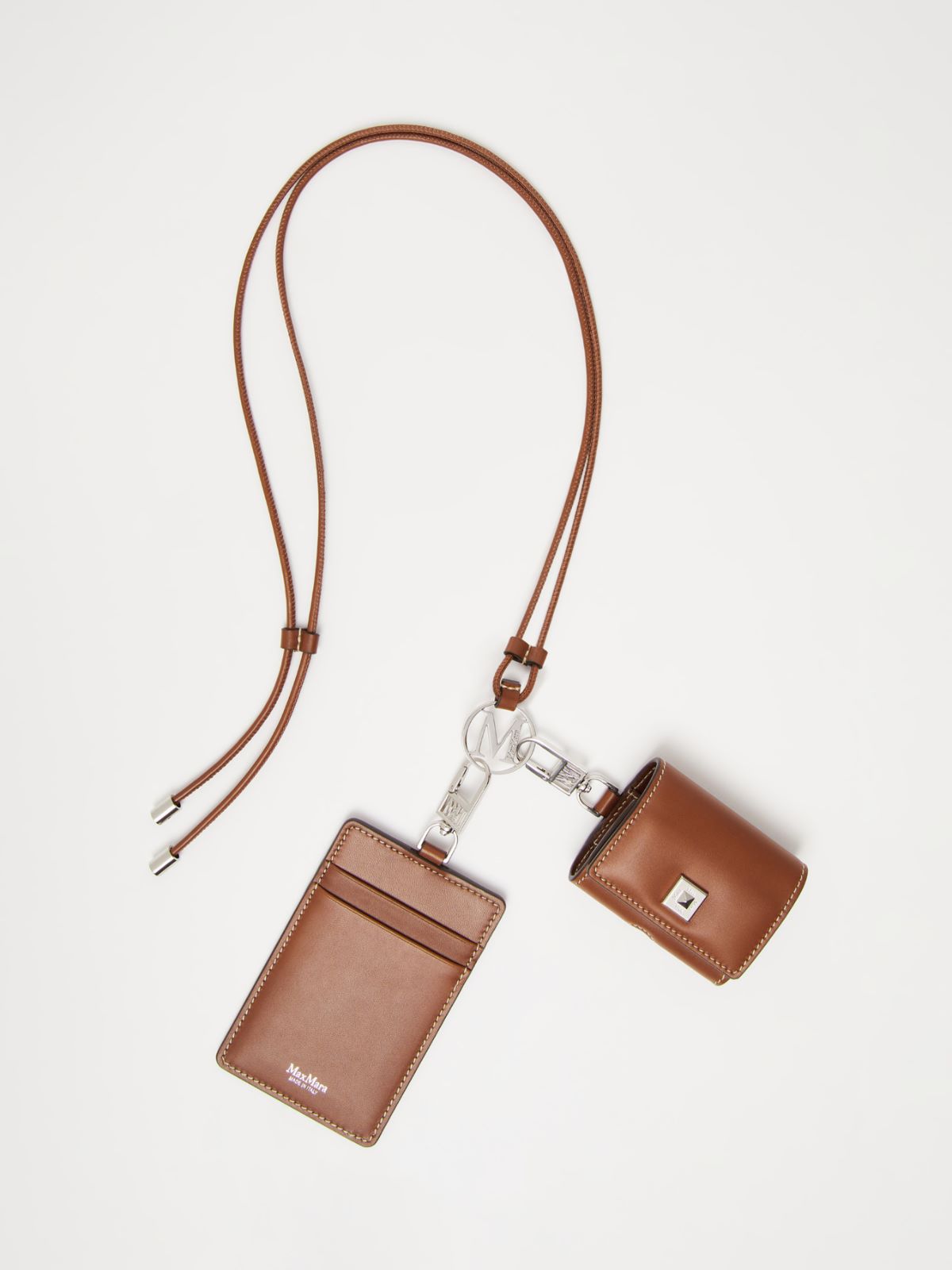 Monogram leather strap with pendant