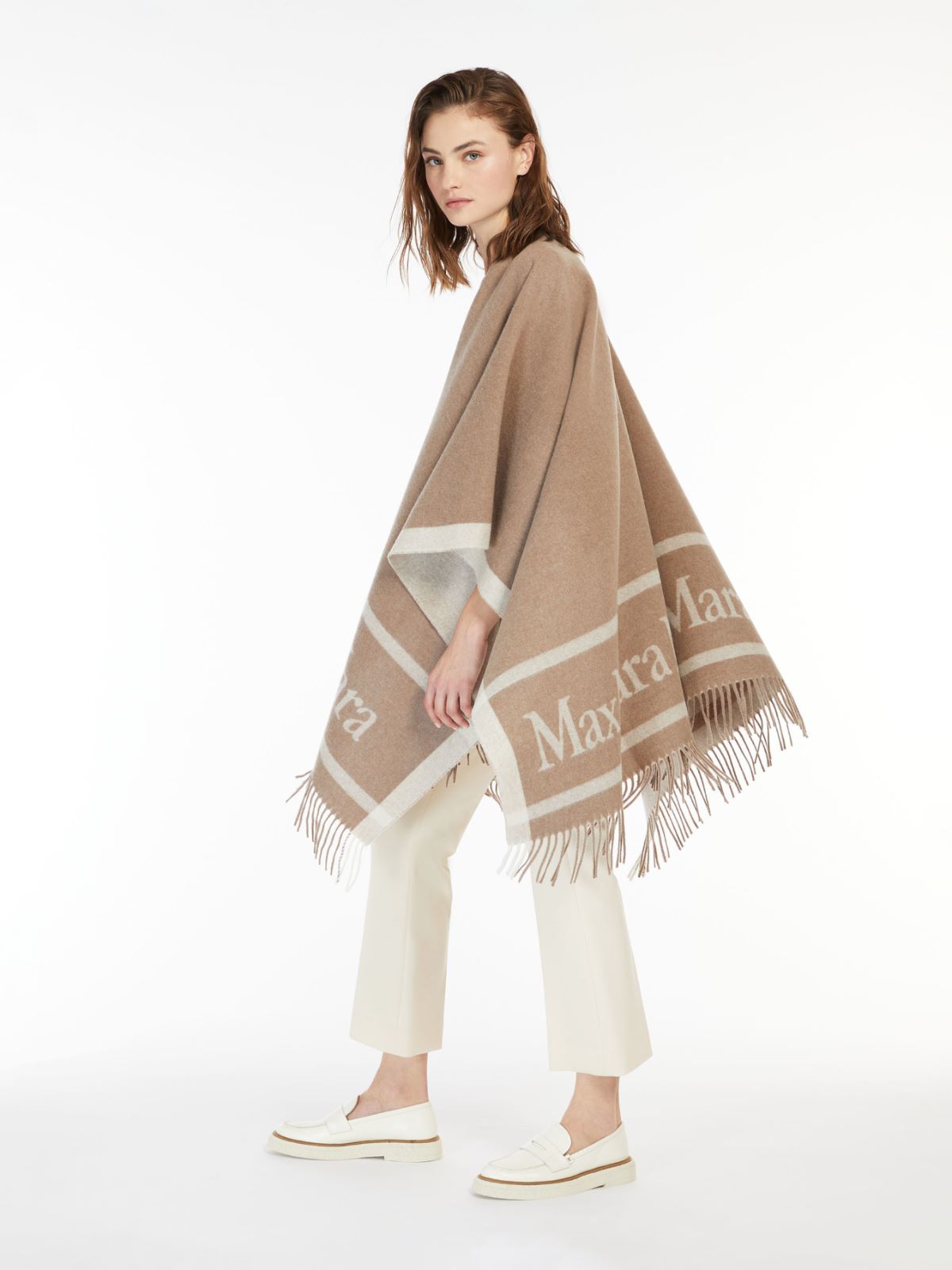 Wool cloak with fringes