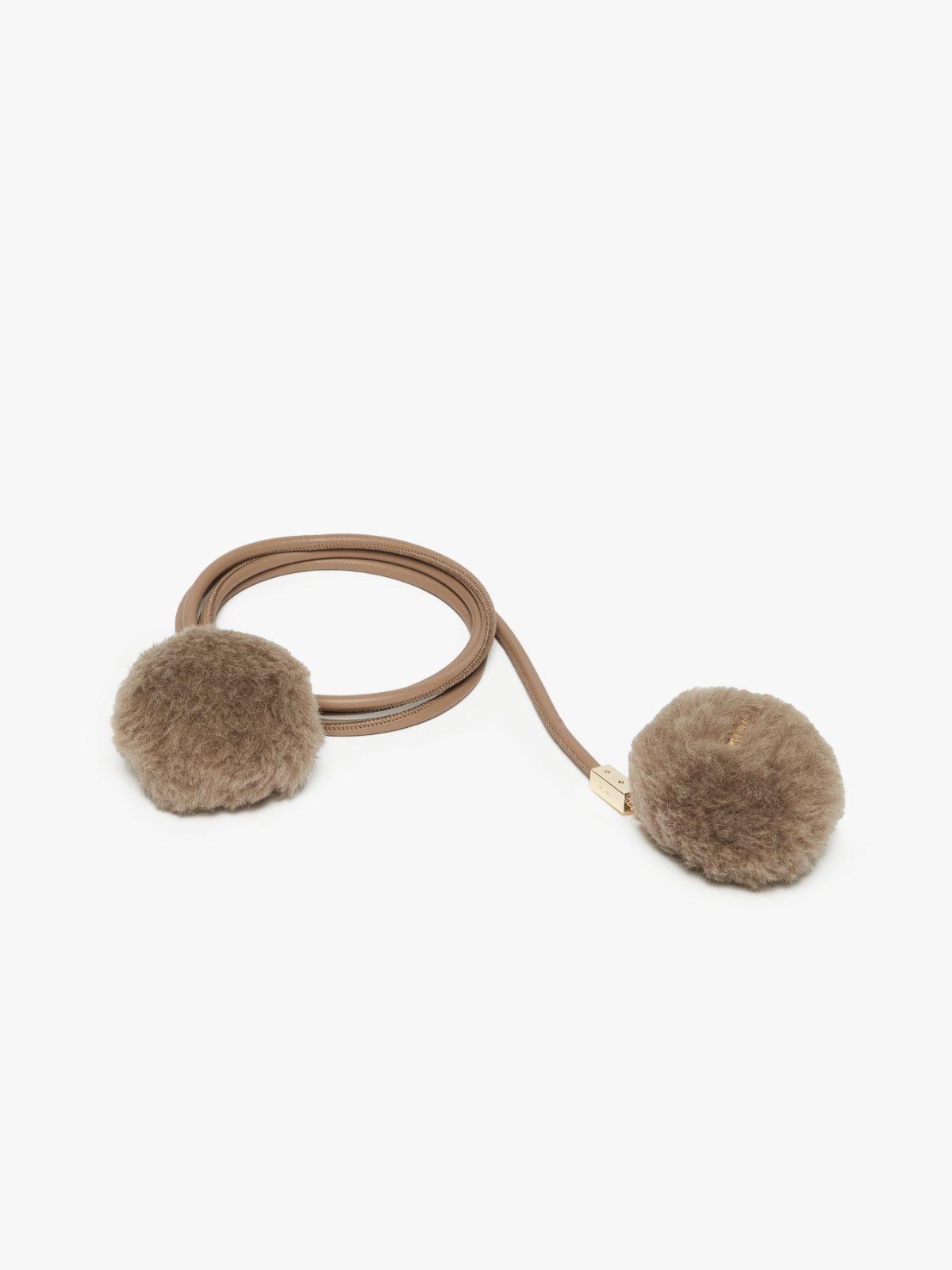 Tubular belt with pom-pom