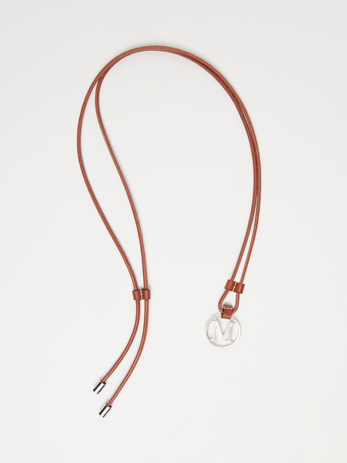 Monogram leather strap with pendant