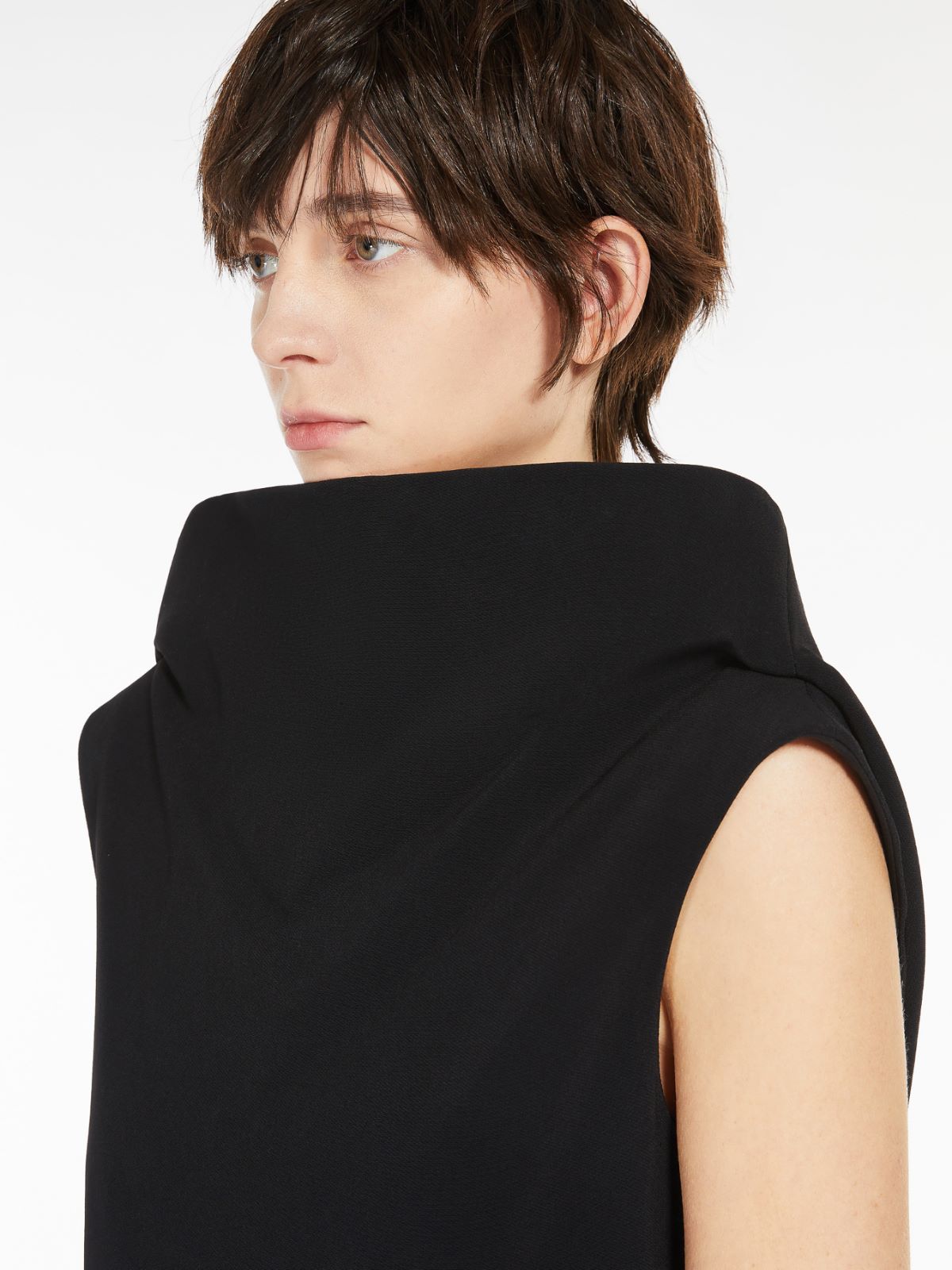 Dress with raised collar