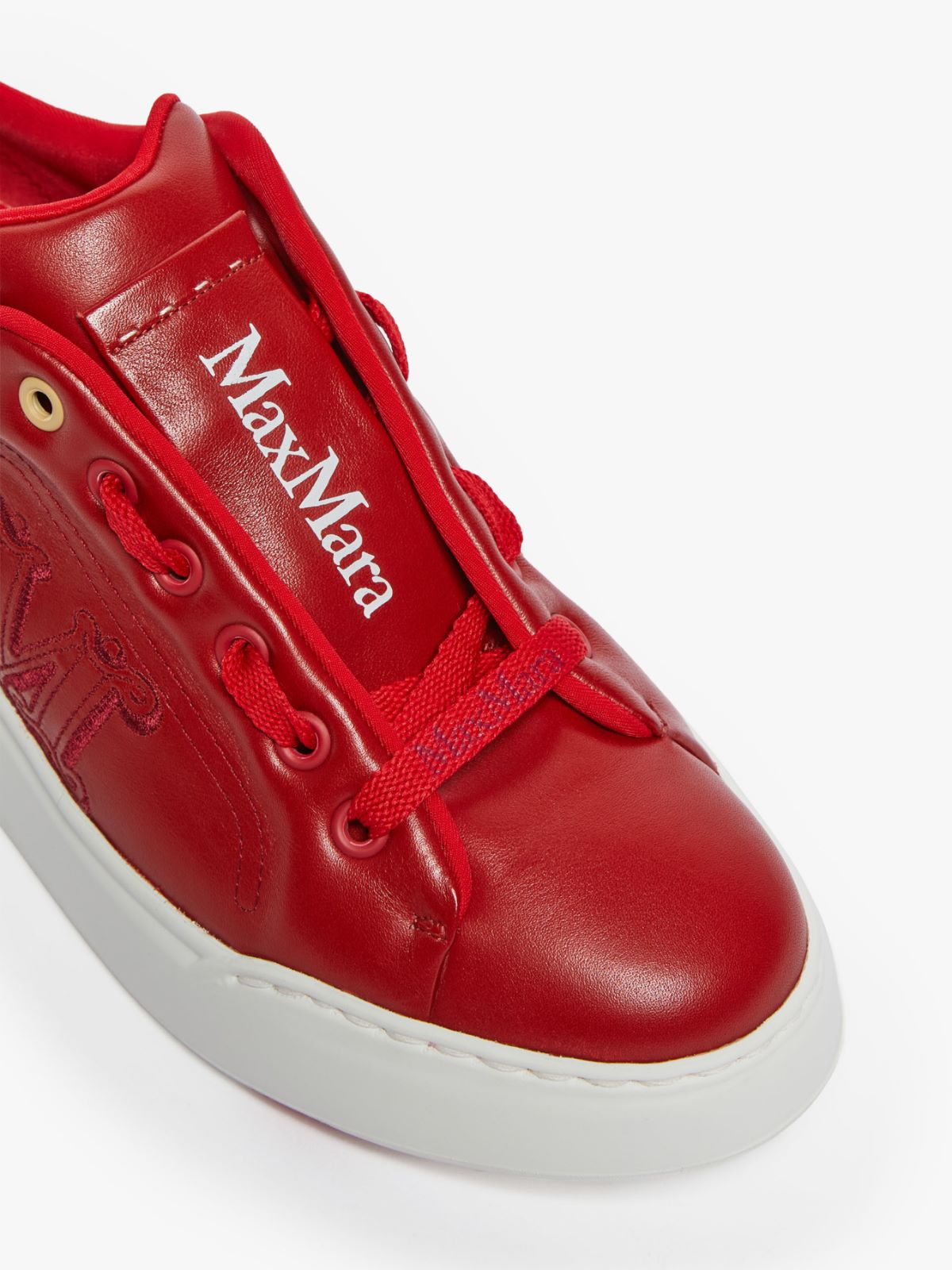 Leather sneakers with embroidery