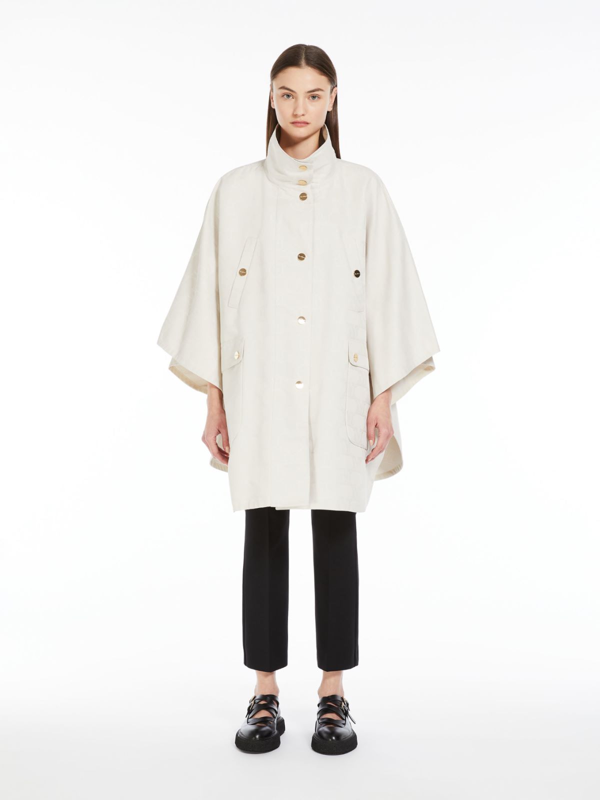 Short cape in water-resistant jacquard