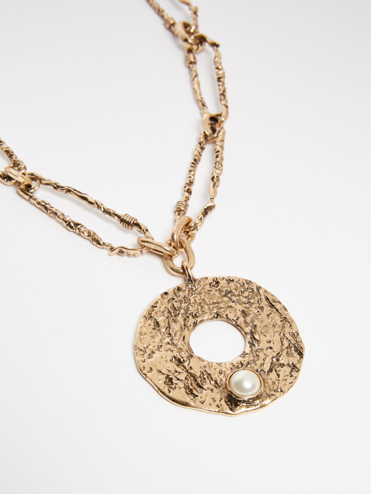 Necklace with safety pins