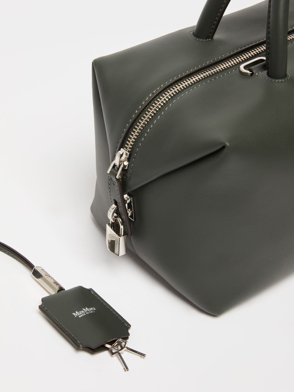 Shiny leather satchel bag