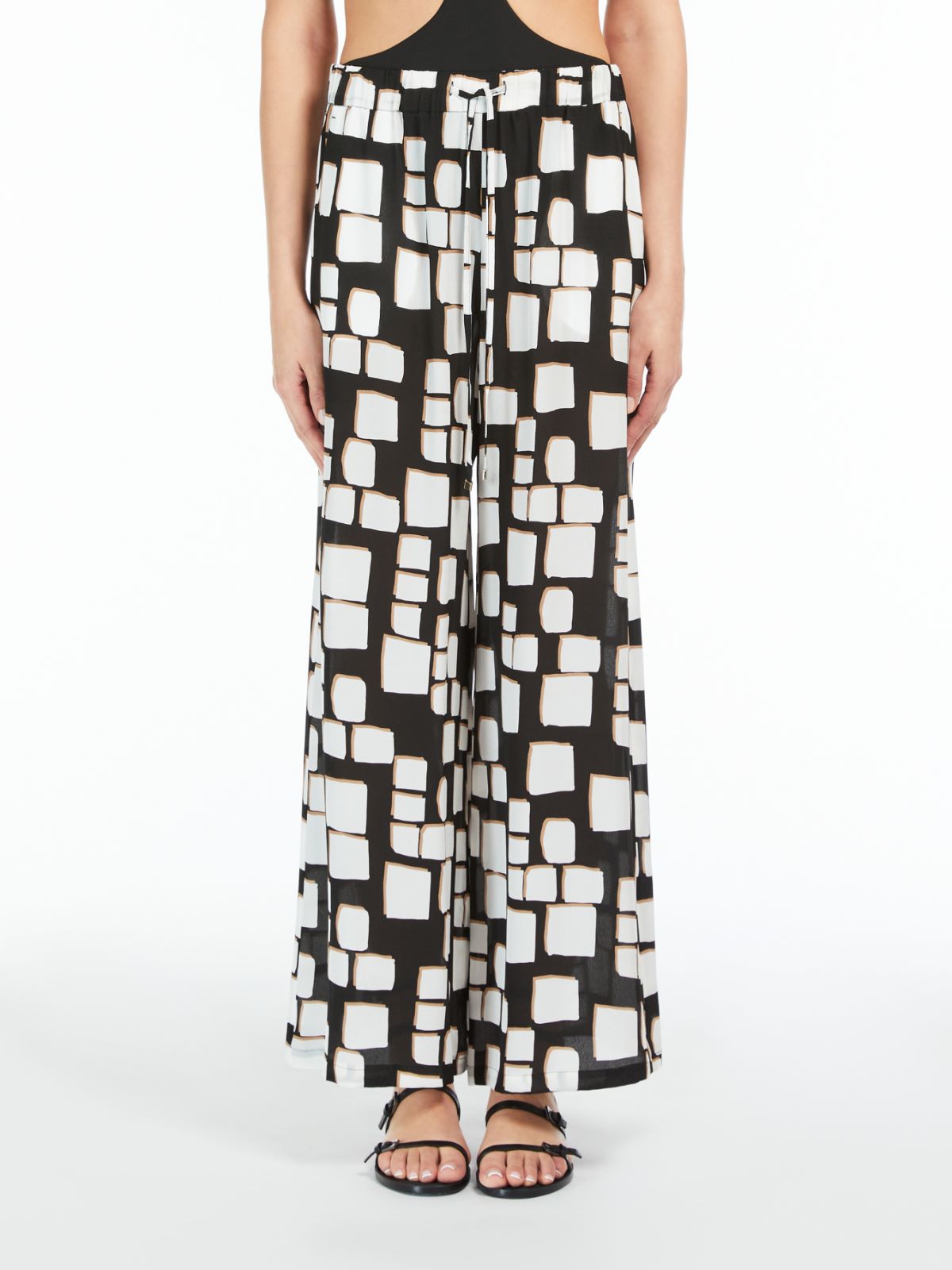 Palazzo trousers in printed silk