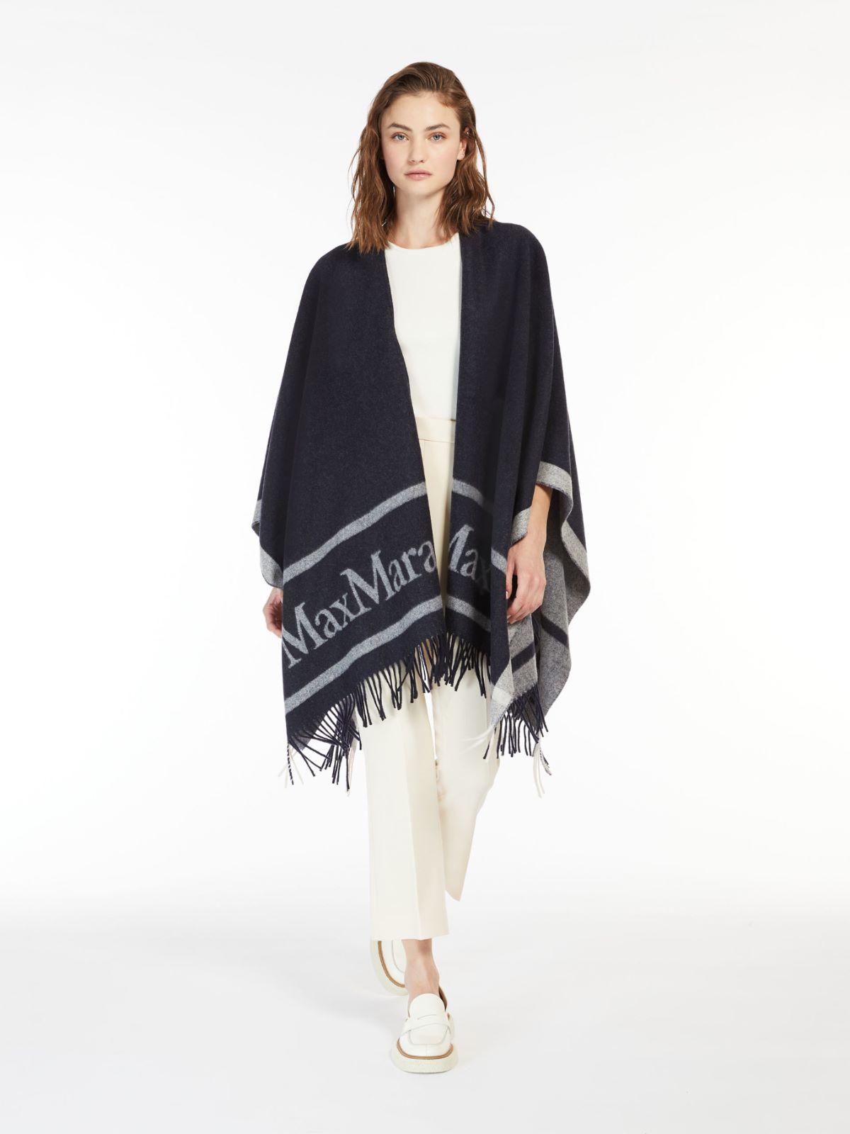 Wool cloak with fringes